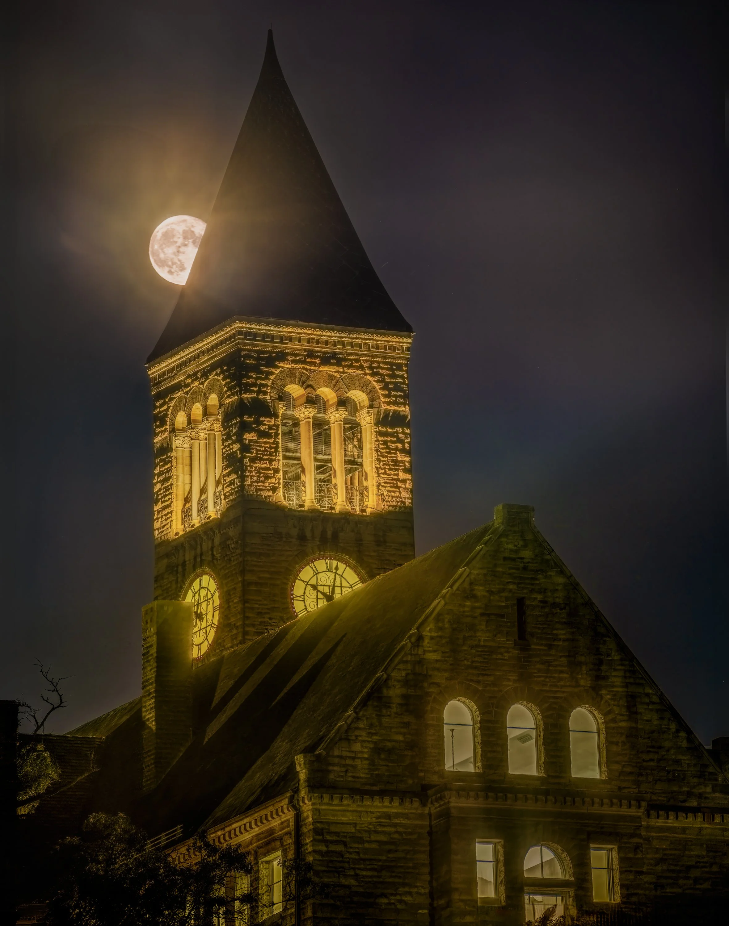 Full moon and McGraw Tower