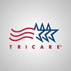 Tricare logo with red waves and a blue arrow pointing right.