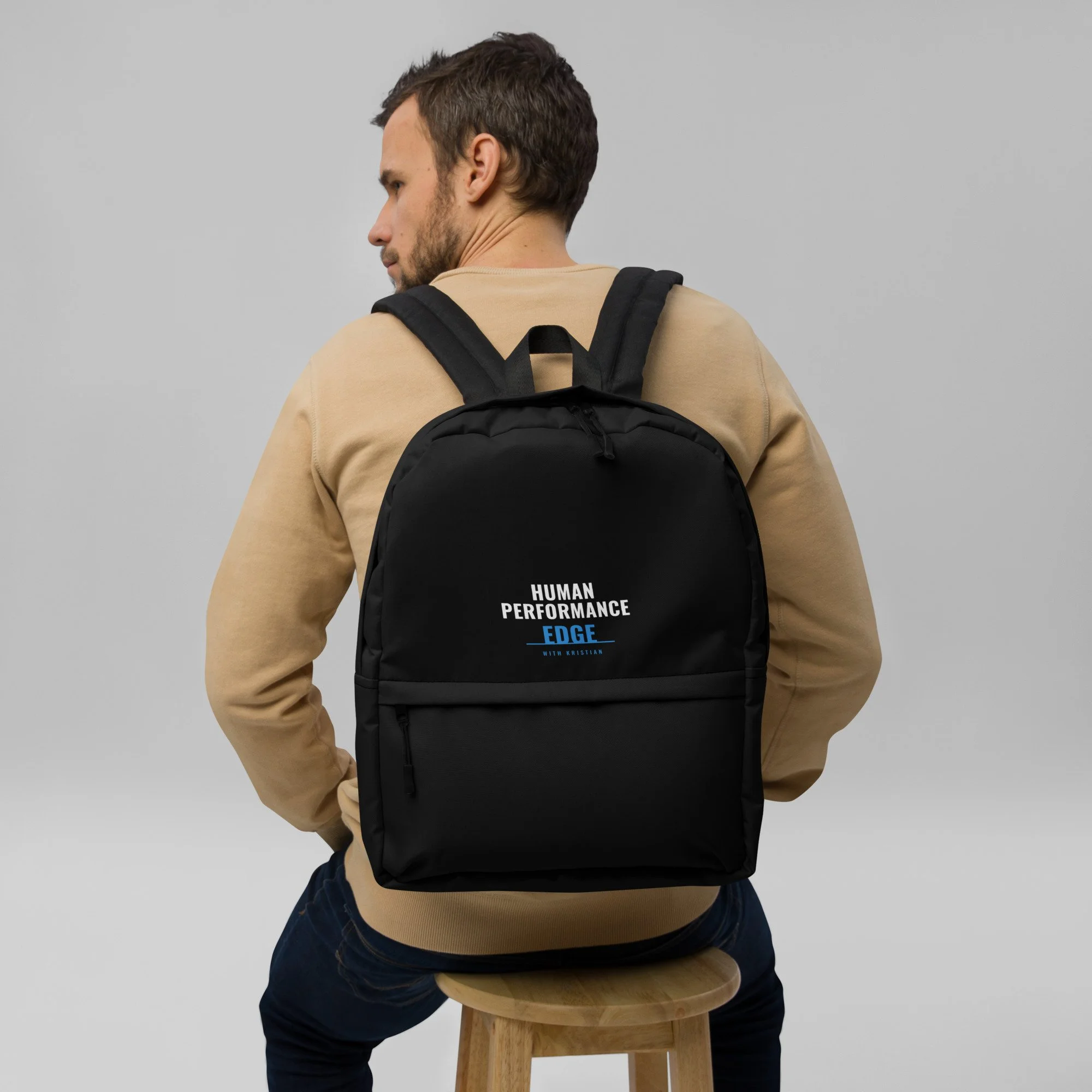 Person wearing black Edge backpack with Human Performance Edge logo