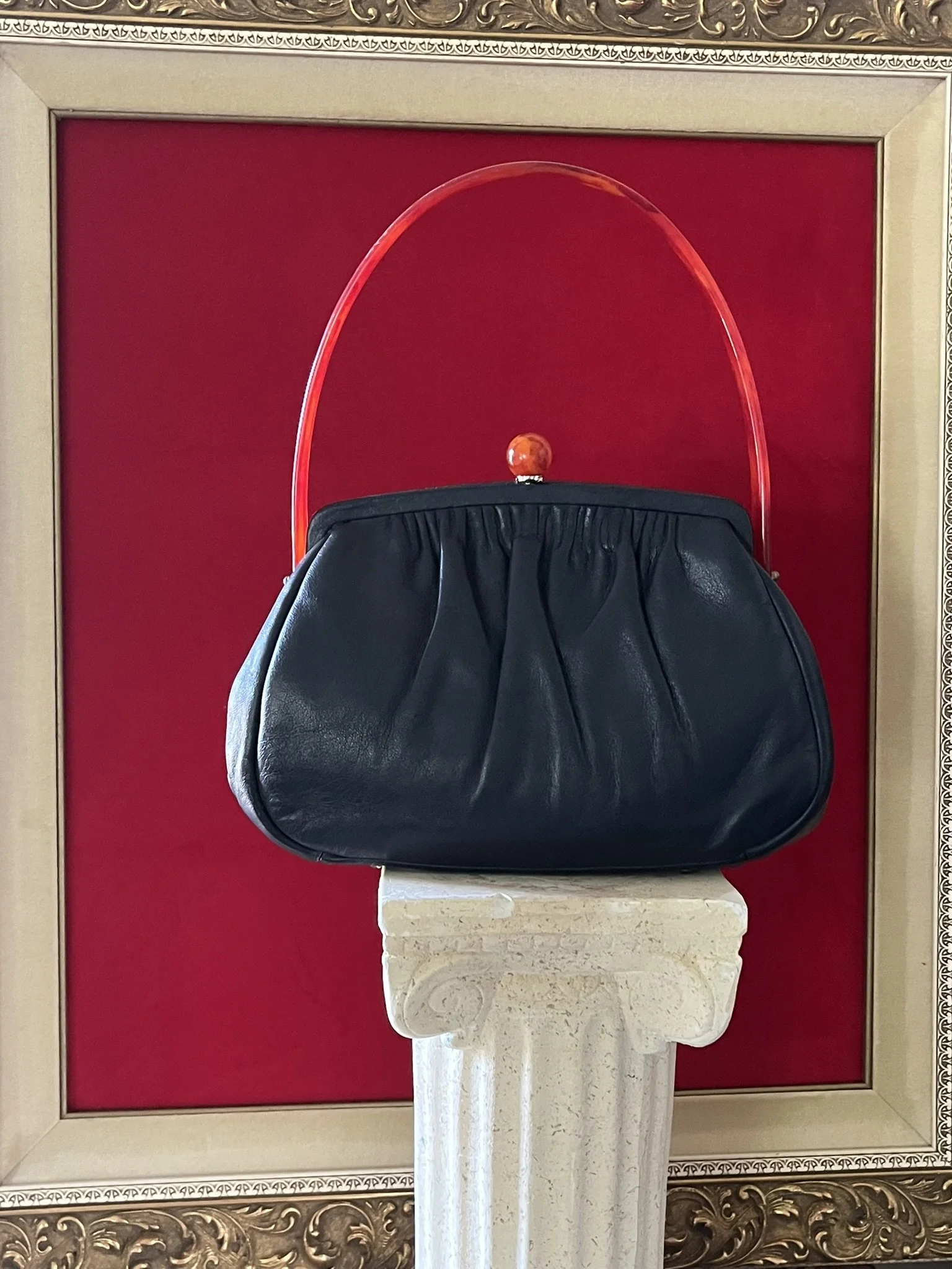 1950s Cherry Amber Bakelite Handle and Kisslock Navy Leather Purse