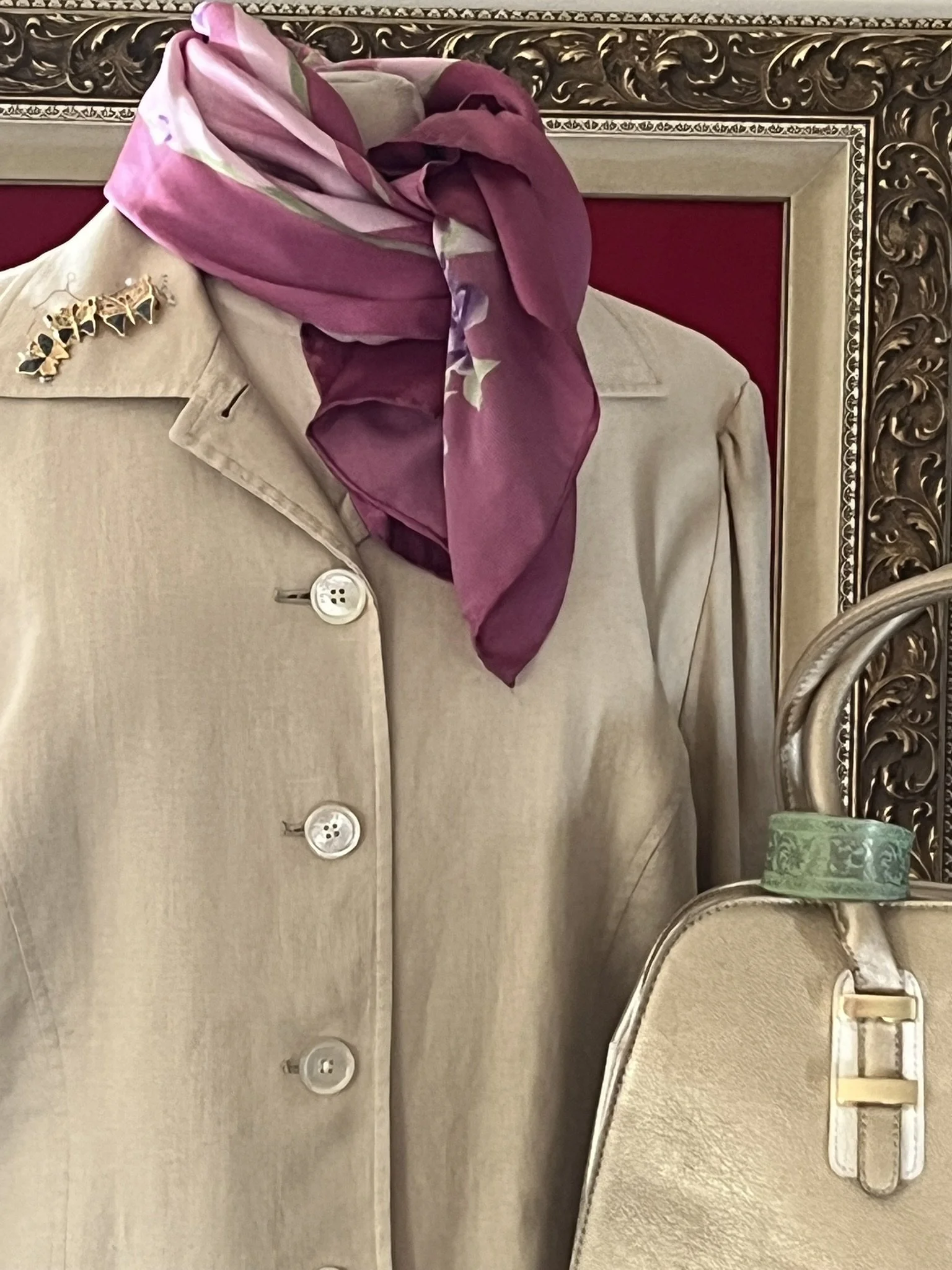 Pink Floral Scarf with Hand Rolled Edges, Gold Charming Charlie Dome Bag, Green Floral Metalic  Bracelet, and Three Butterfly Pin with floating pearls
