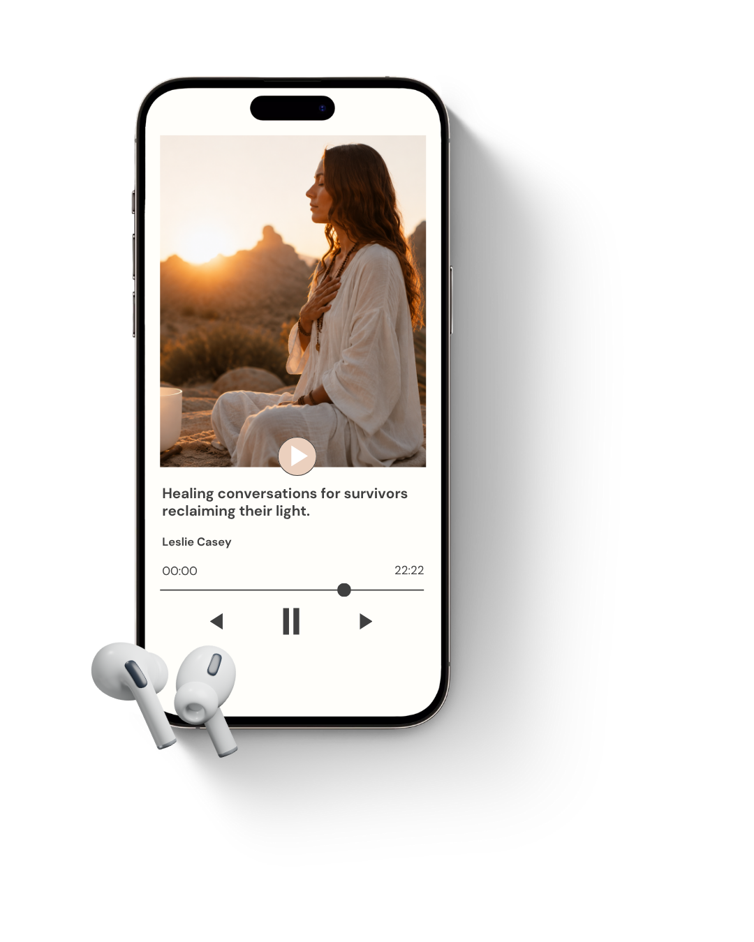 Smartphone displaying a meditation or wellness app featuring a woman meditating outdoors during sunset, with wireless earbuds placed in front.