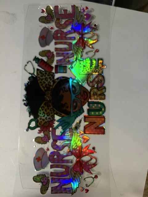 Colorful decorative sticker featuring a cartoon girl with glasses and curly hair, surrounded by flowers, butterflies, hearts, and the words 'Nursery Queen' with rainbow colors and holographic elements.