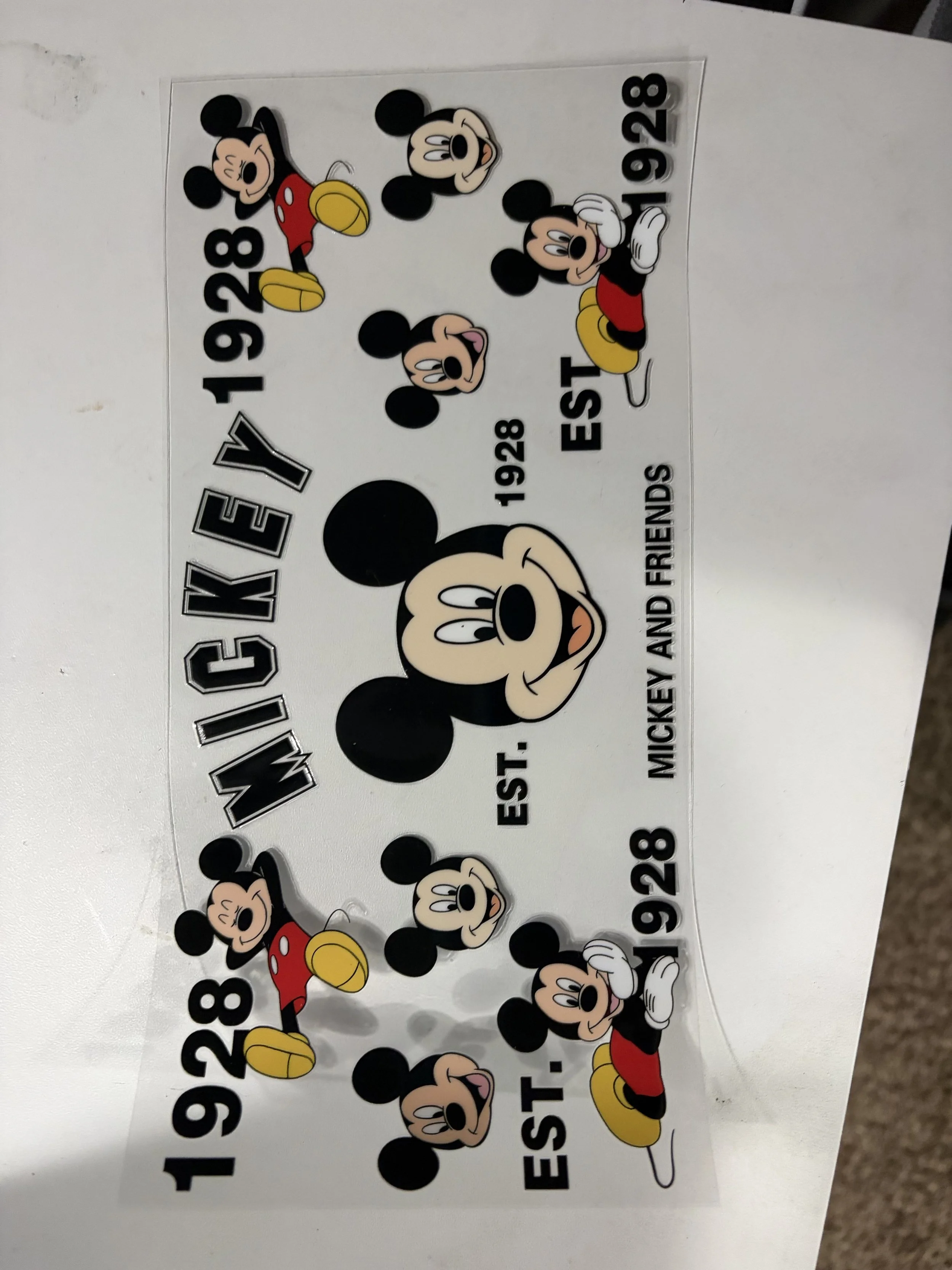 Mickey Mouse themed birthday countdown calendar with images of Mickey Mouse around the numbers 1 to 29 and the text 'EST. 1928 MICKEY AND FRIENDS'.