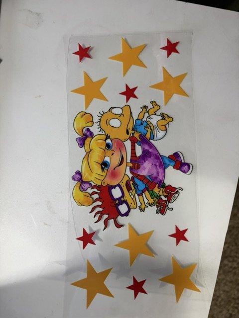 Colorful poster of children and stars on a white background.