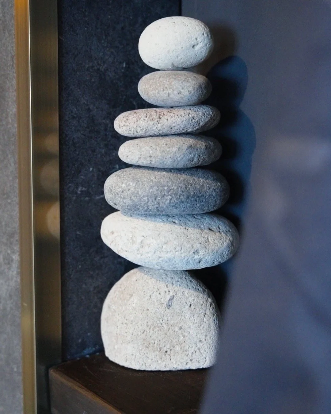 Spa stones representing relaxation and recovery at Contrast Recovery.