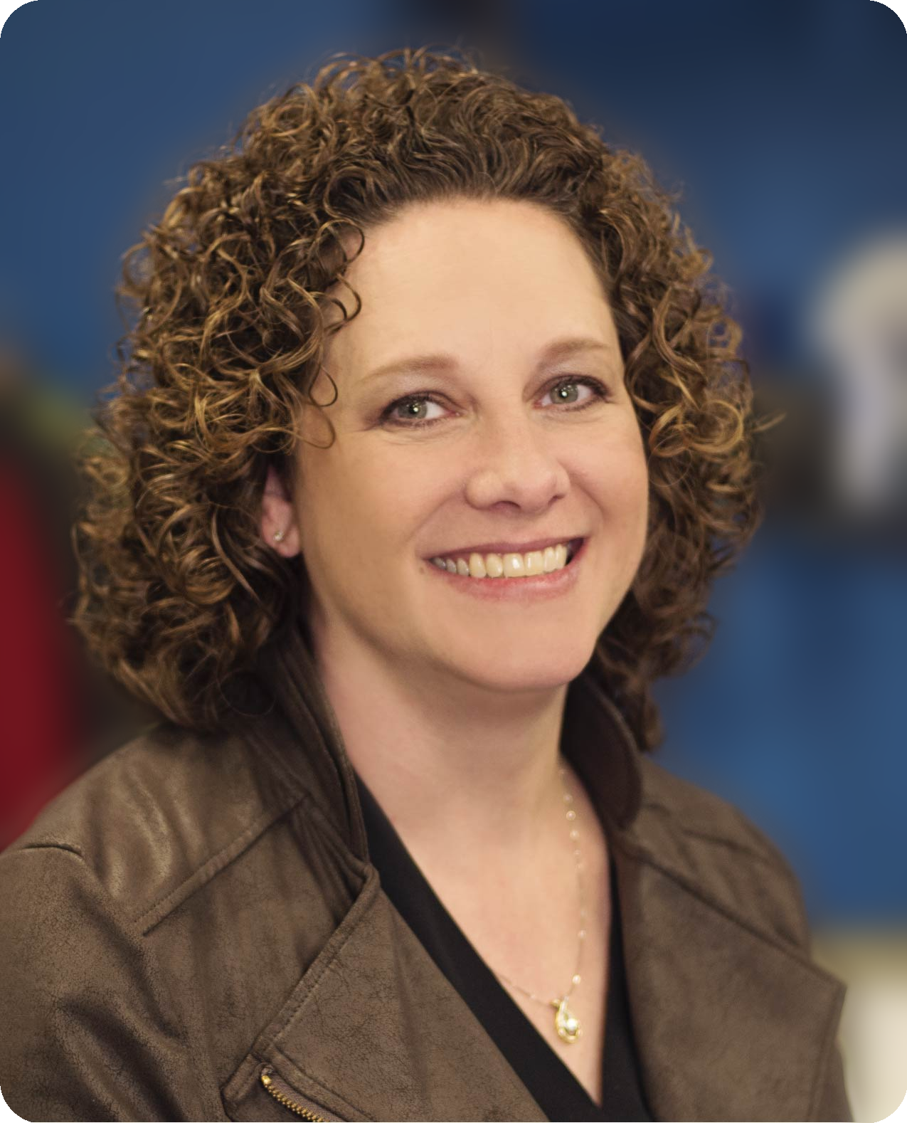 Christi Nowak, owner of Organized Everyday, LLC, smiling