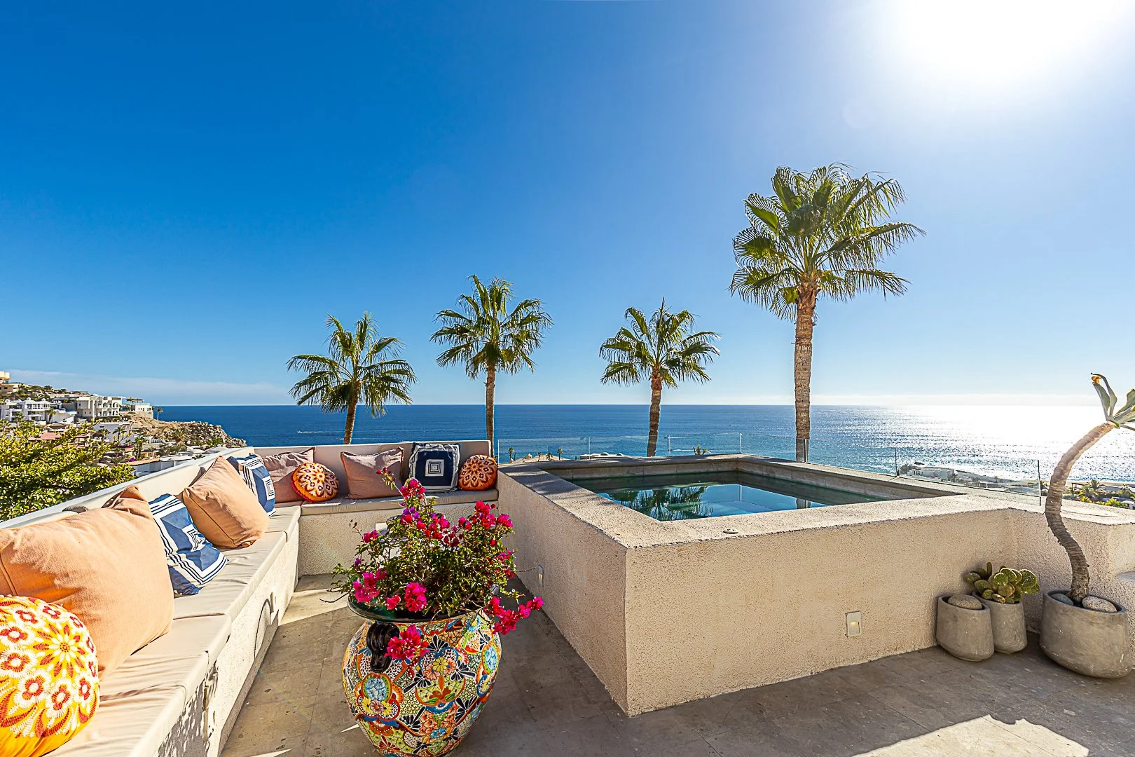 Rooftop jacuzzi and lounge area with ocean views at Casa Dos Hermanas in Cabo San Lucas