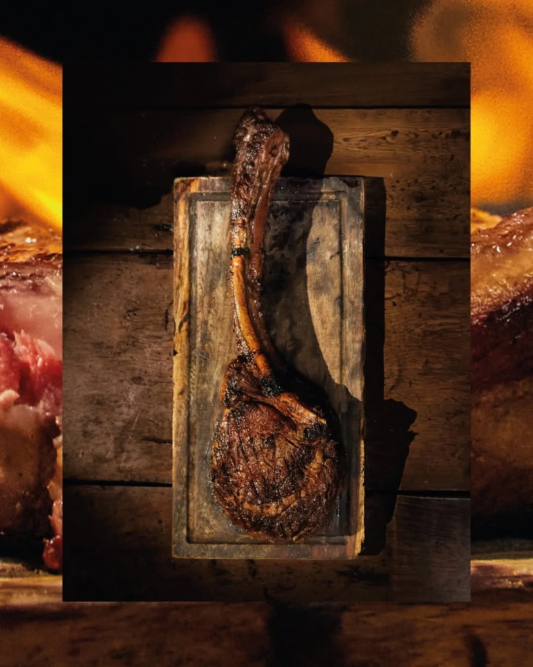 A cooked Tomahawk steak resting on a wooden cutting board.