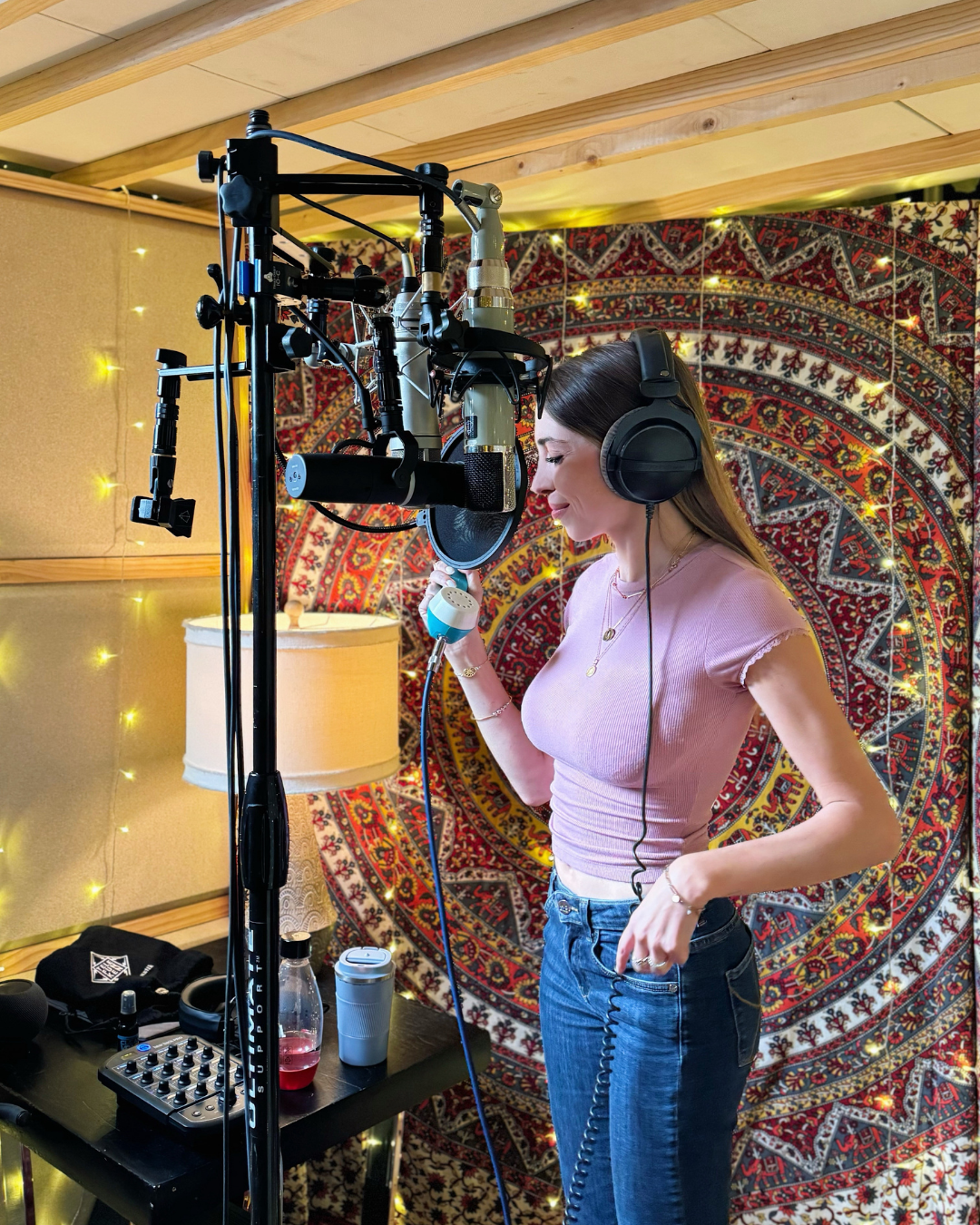 Alice recording her debut single Echoes of You at the studio.