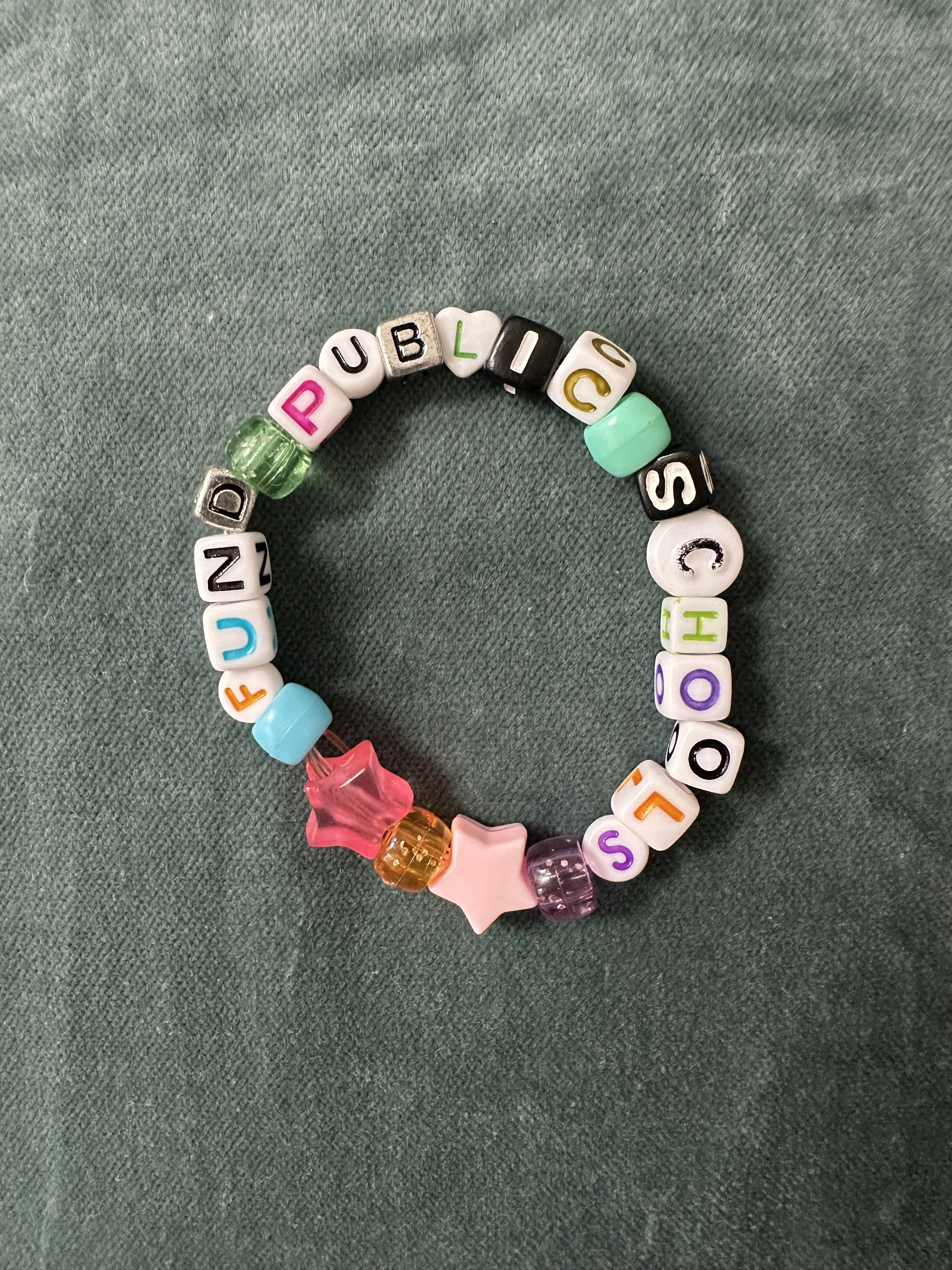 Friendship bracelet made by my daughter - Fund Public Schools!