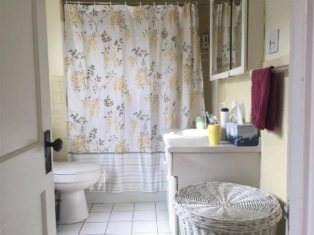 Tired Bathroom Before Renovation.jpeg