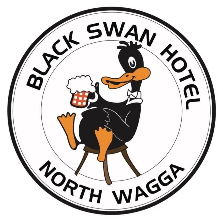 Logo of Black Swan Hotel featuring a cartoon black swan holding a beer mug, sitting on a stool with a white background and black circular border with text.