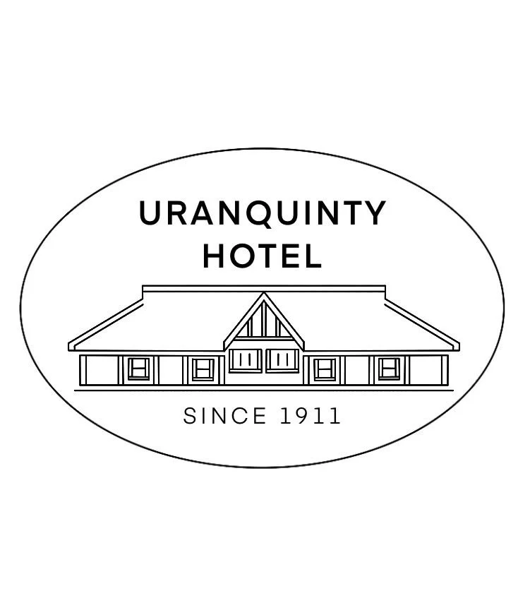Line drawing of a building with the text 'Uranquinty Hotel' above it and 'Since 1911' below.