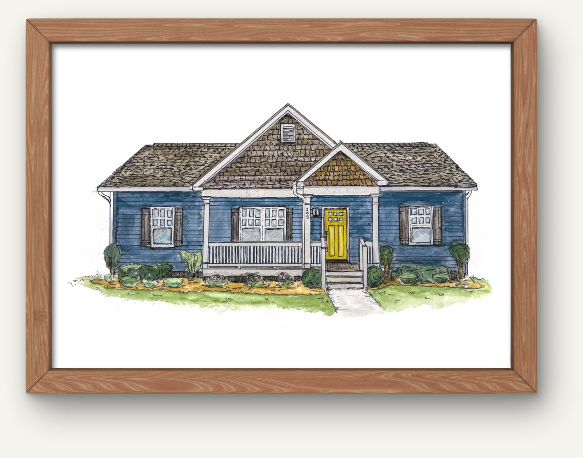 A framed watercolor illustration of a blue house with a yellow door, front porch, and landscaped yard.
