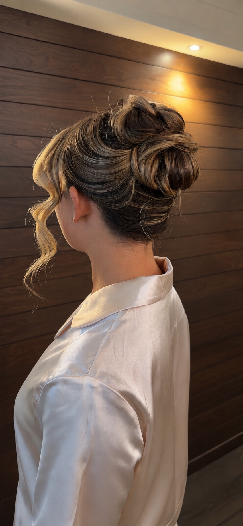 bridesmaid bridal party hairstyling in a modern French twist.