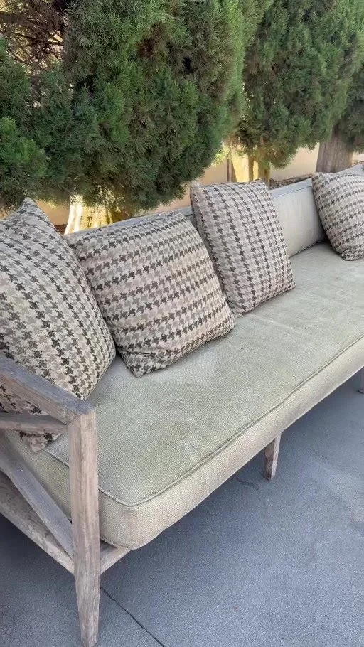 Weathered teak outdoor sofa before professional cleaning sanding and oiling
