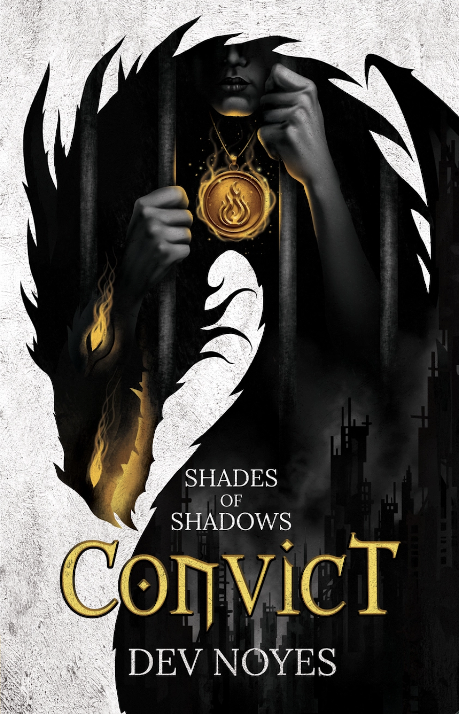Book cover for 'Shades of Shadows: Convict' by Dev Noyes featuring a dark, shadowy figure behind prison bars, holding a glowing gold medallion with a flame symbol, with dark cityscape in the background.
