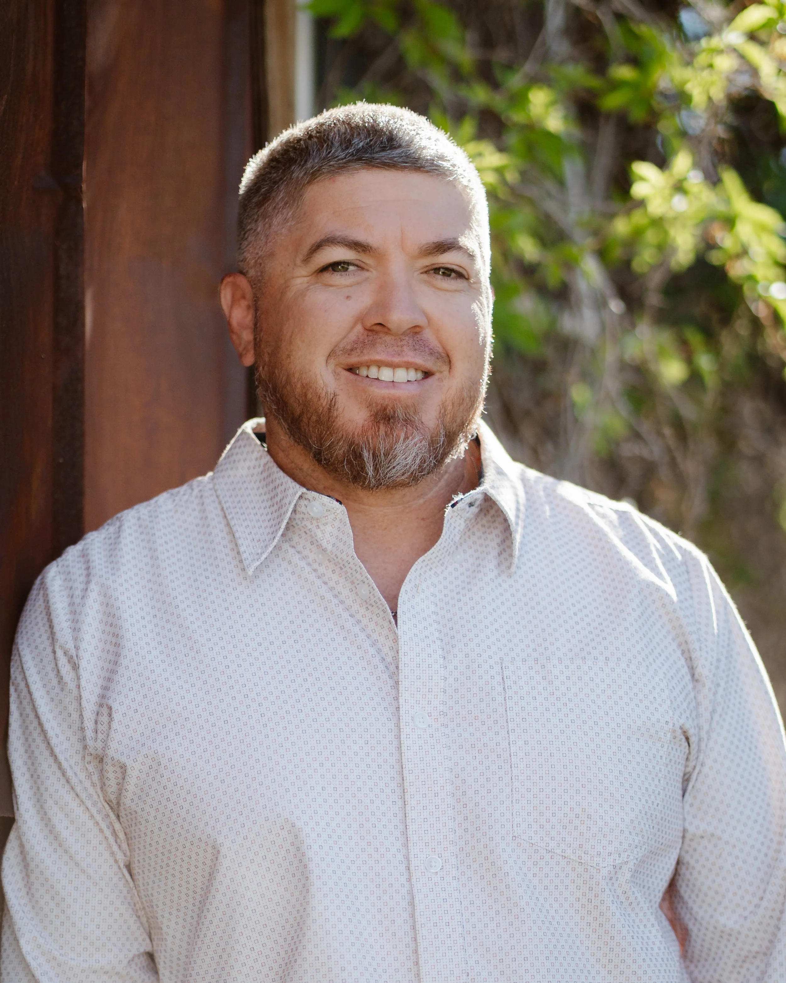 Headshot image of Aaaron Ruesch the owner of Hogum Powerline Construction