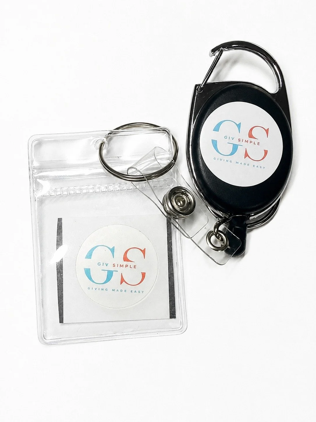 A keychain and badge holder with a logo that says "GIV SIMPLE, GIVING MADE EASY" on a white background.
