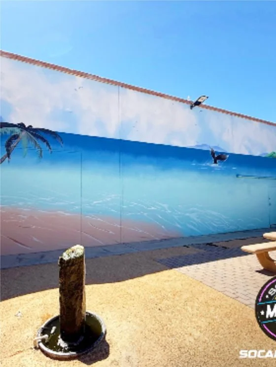 Exterior beach-themed wall mural by SoCal Murals, Southern California
