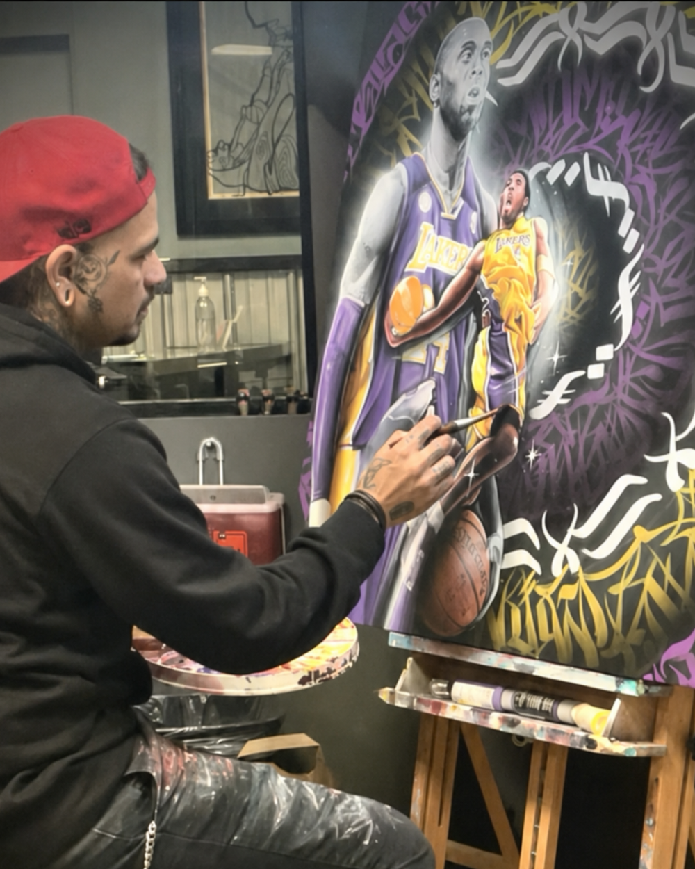 José “Cheech” Zamora creating a custom Kobe Bryant painting