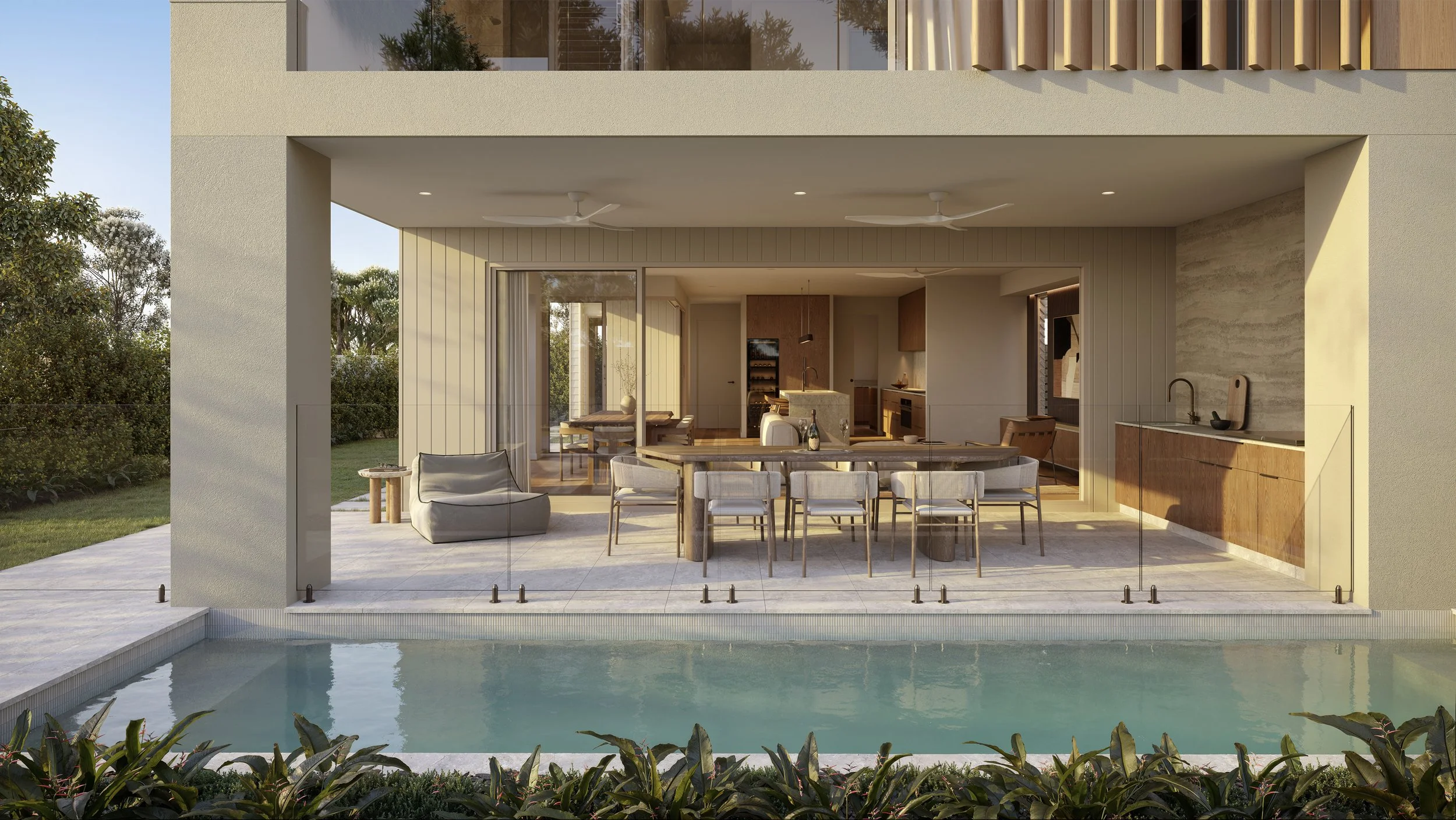 Modern house with an outdoor patio, glass railing, swimming pool, and lush greenery in the background.