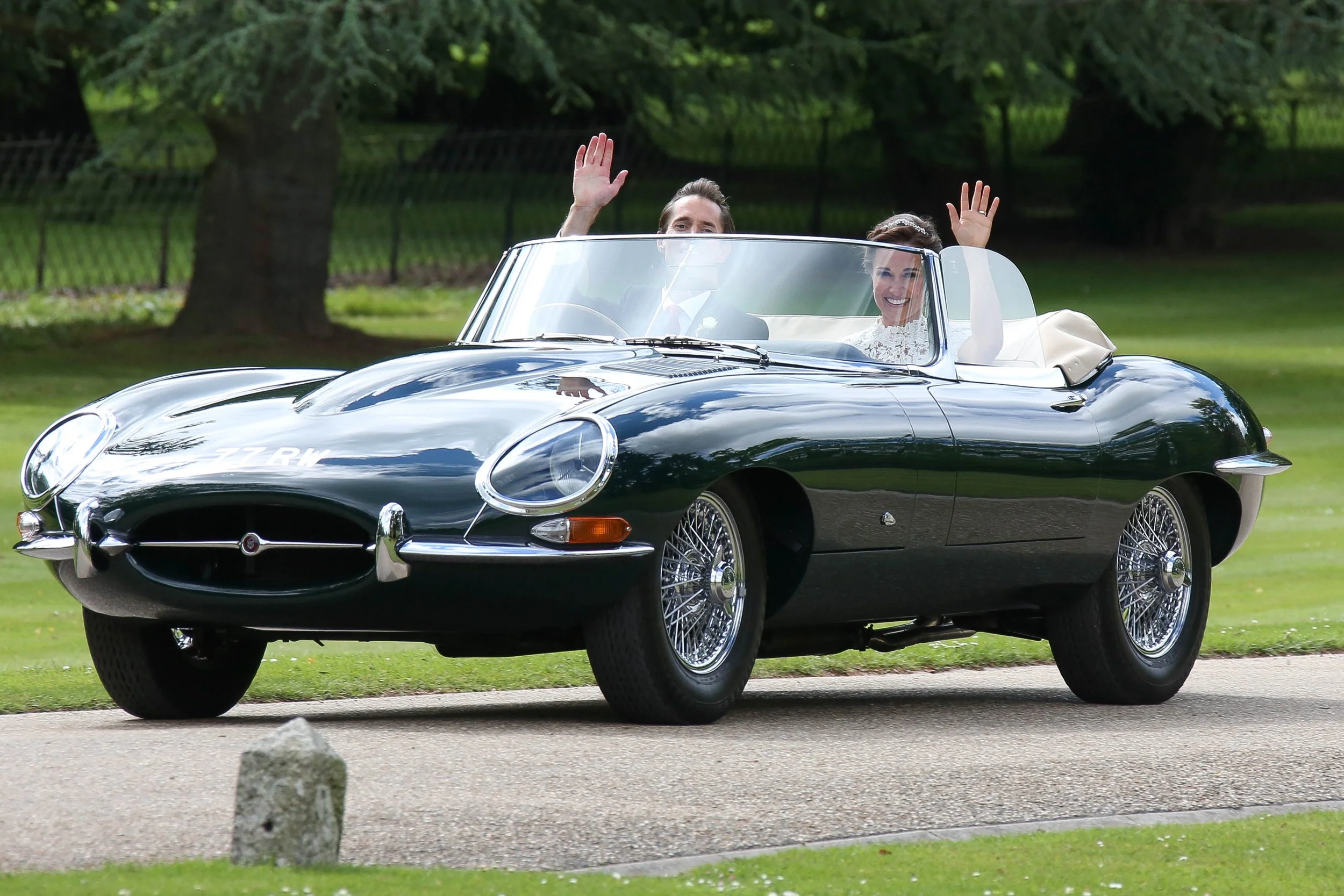 Pippa Middleton and James on wedding day in e Type Jaguar