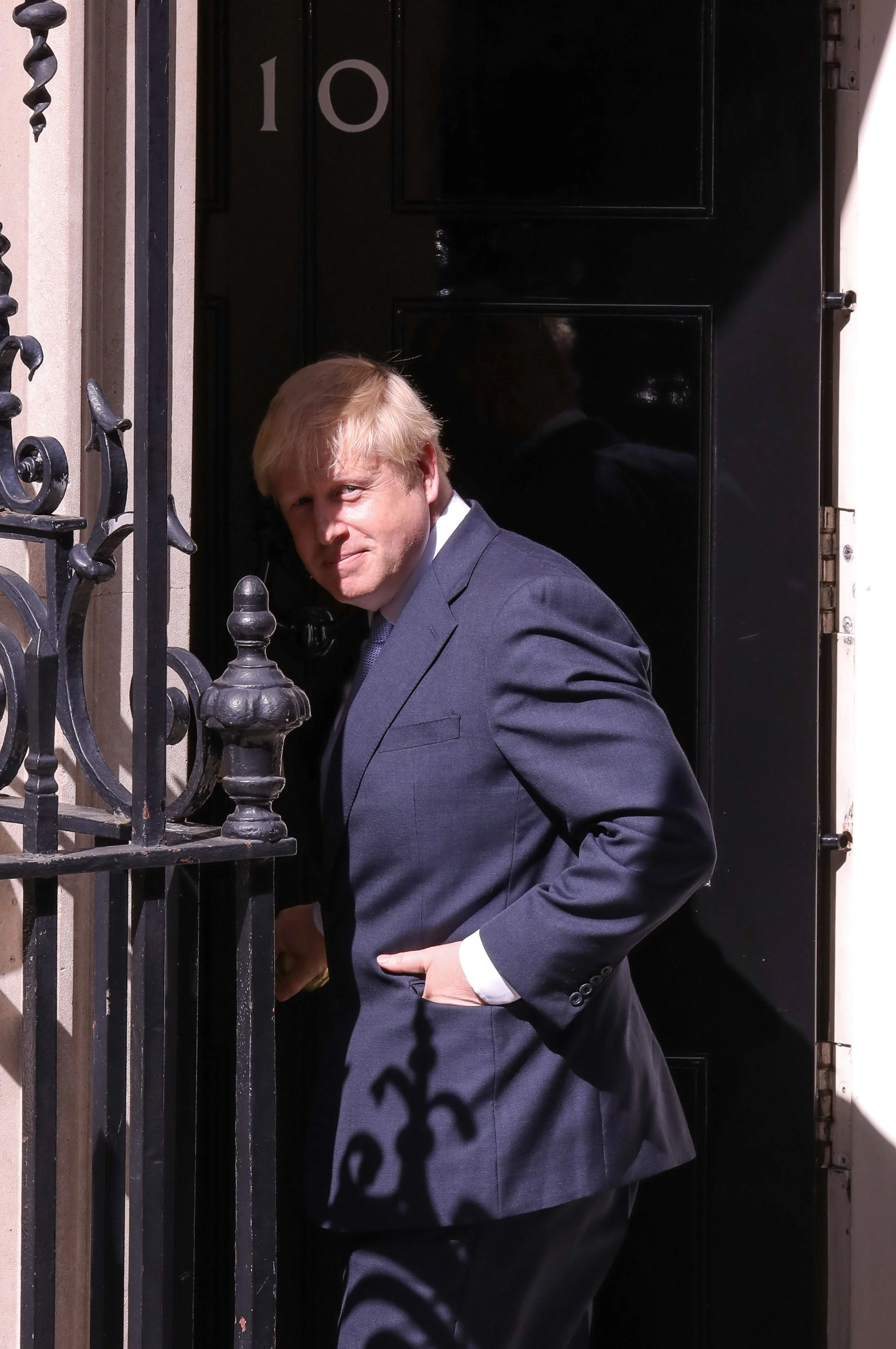 Boris Johnson enters 10 Dowing Street for the first time as Prime Minister