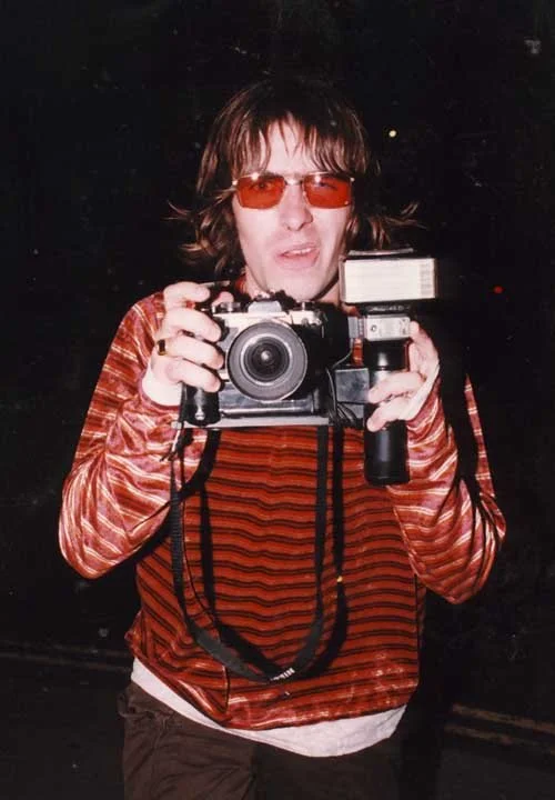 Liam Gallagher steals camera and attempts to take a picture Nobu restaurant London