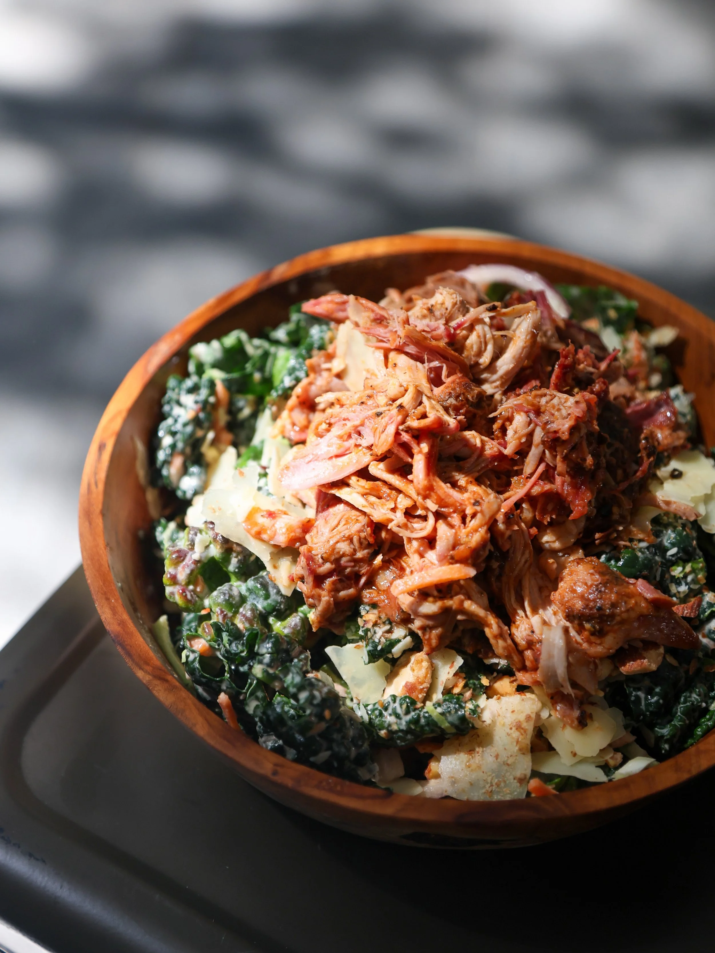 A little lighter, still big on flavour. The Decker Kale Bowl keeps it hearty with kale, parmesan, almonds, carrots, red onions and tahini dressing, then lets you choose your smoke.

Top it with pulled pork, smoked chicken, chopped brisket, pork spare
