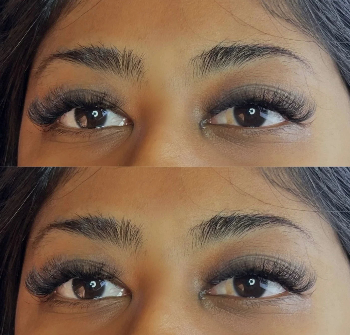 Close-up of a woman's eyes with dark, voluminous eyelashes and groomed eyebrows.