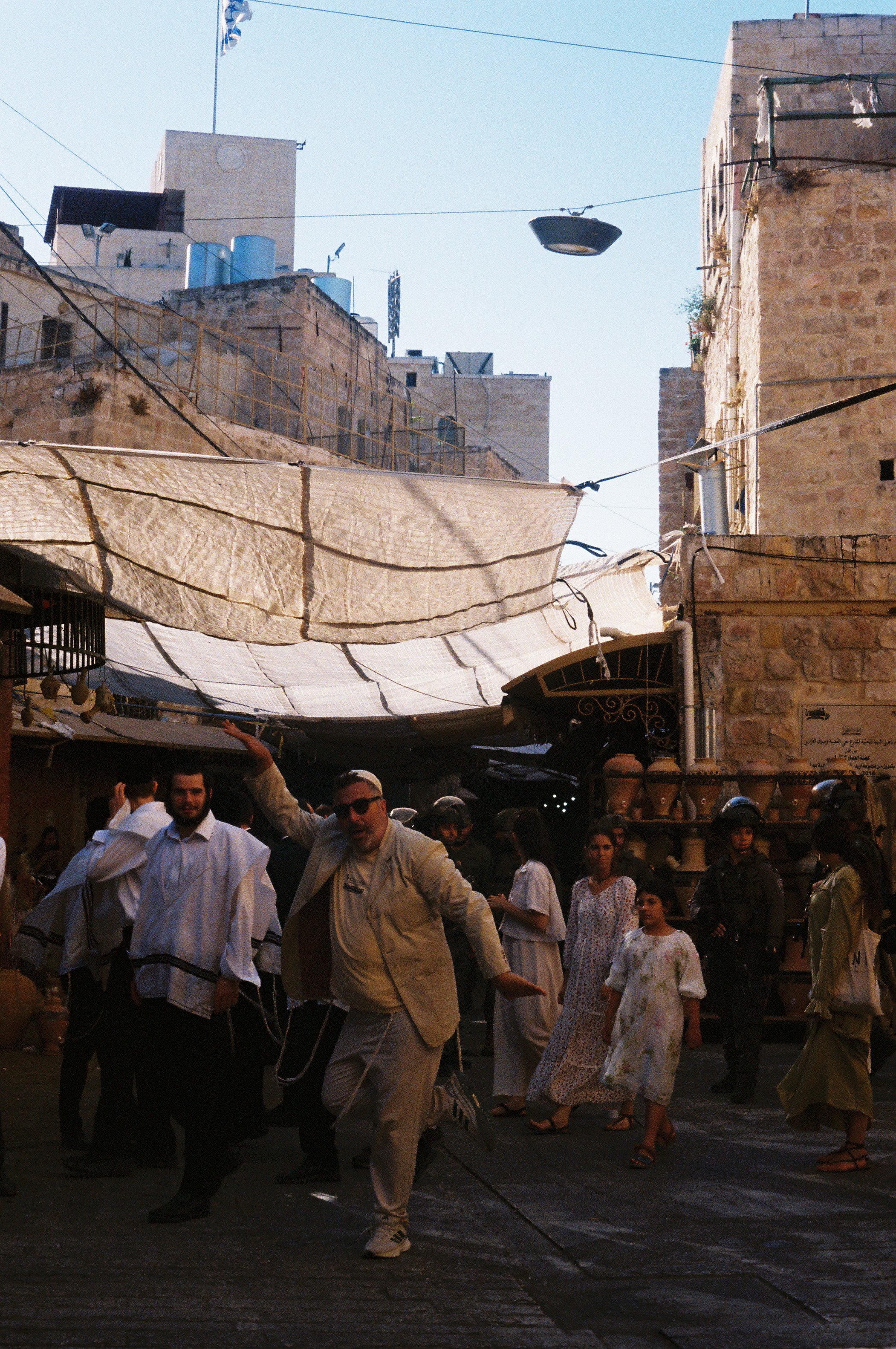 Israeli Settler Mocks Onlooking Palestinians