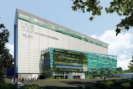 Bâtiment moderne pour la valorisation énergétique avec logo sit.pm sur la façade