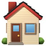 Une petite maison en bois beige avec un toit rouge, une porte en bois et une fenêtre bleue.