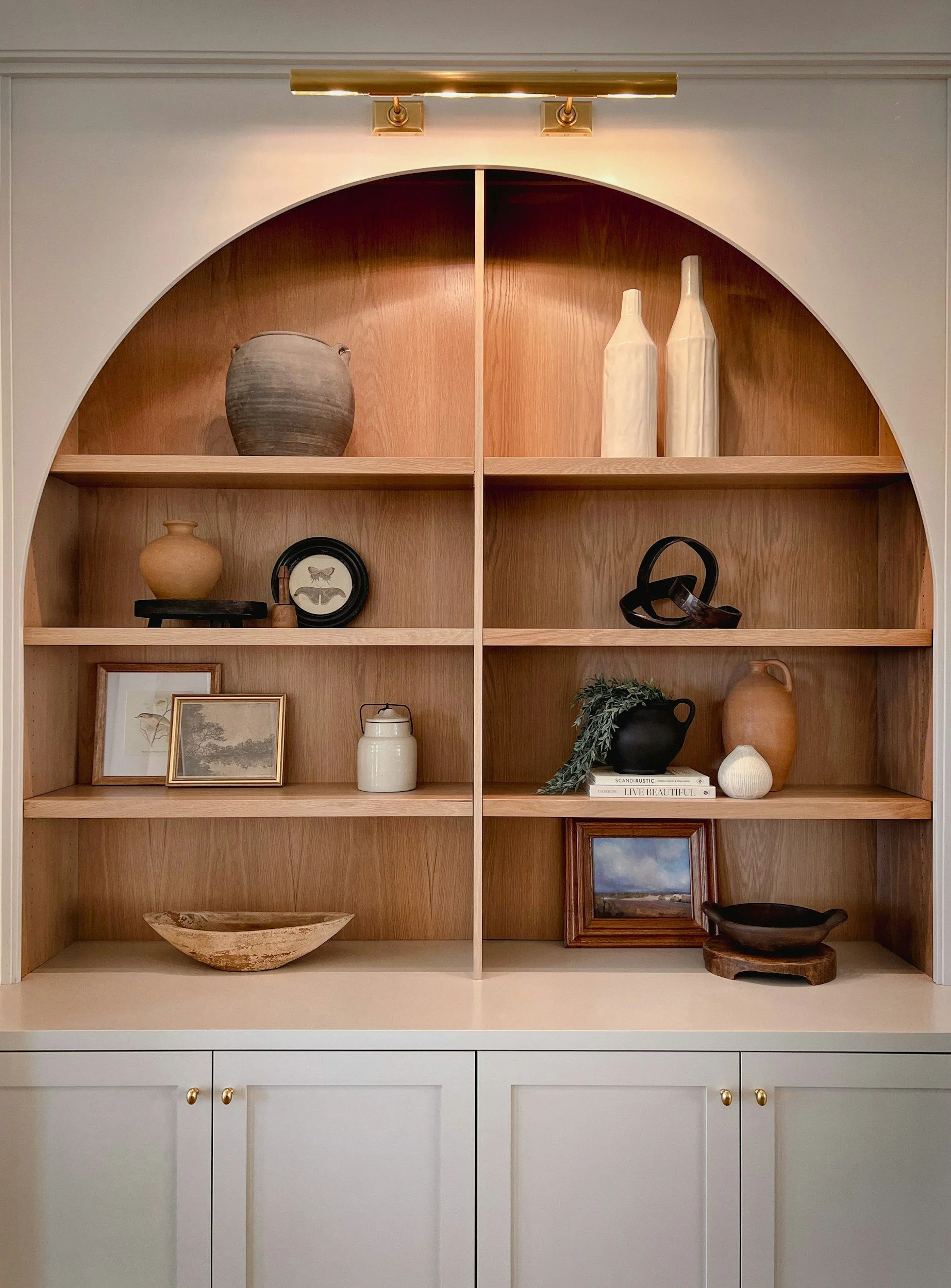 Arched bespoke shelving and furniture Picasso Design services
