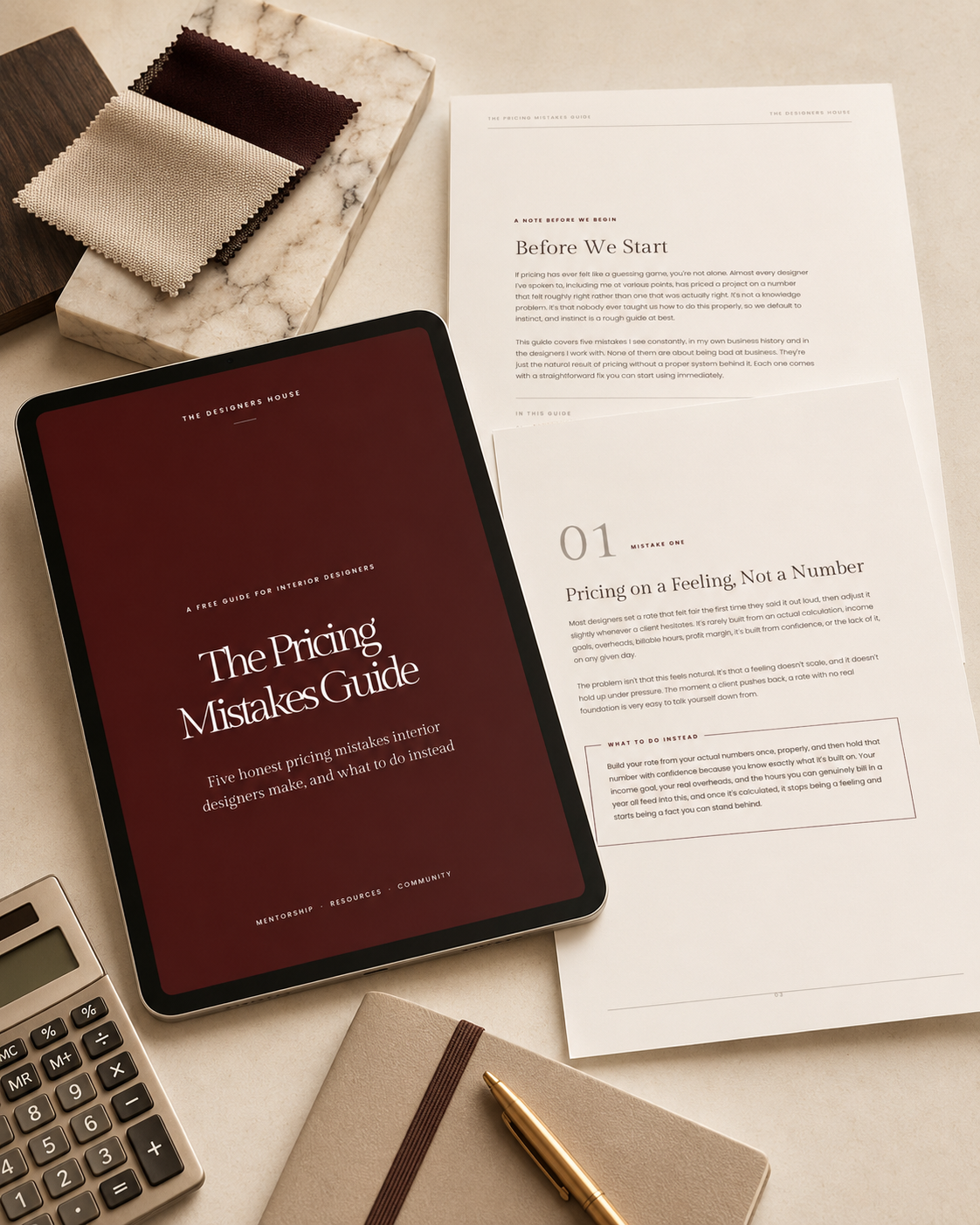 An iPad displaying a guide titled "The Pricing Mistakes Guide" next to printed pages with text about pricing mistakes, fabric swatches on a marble block, a calculator, a notebook, and a pen on a white desk.