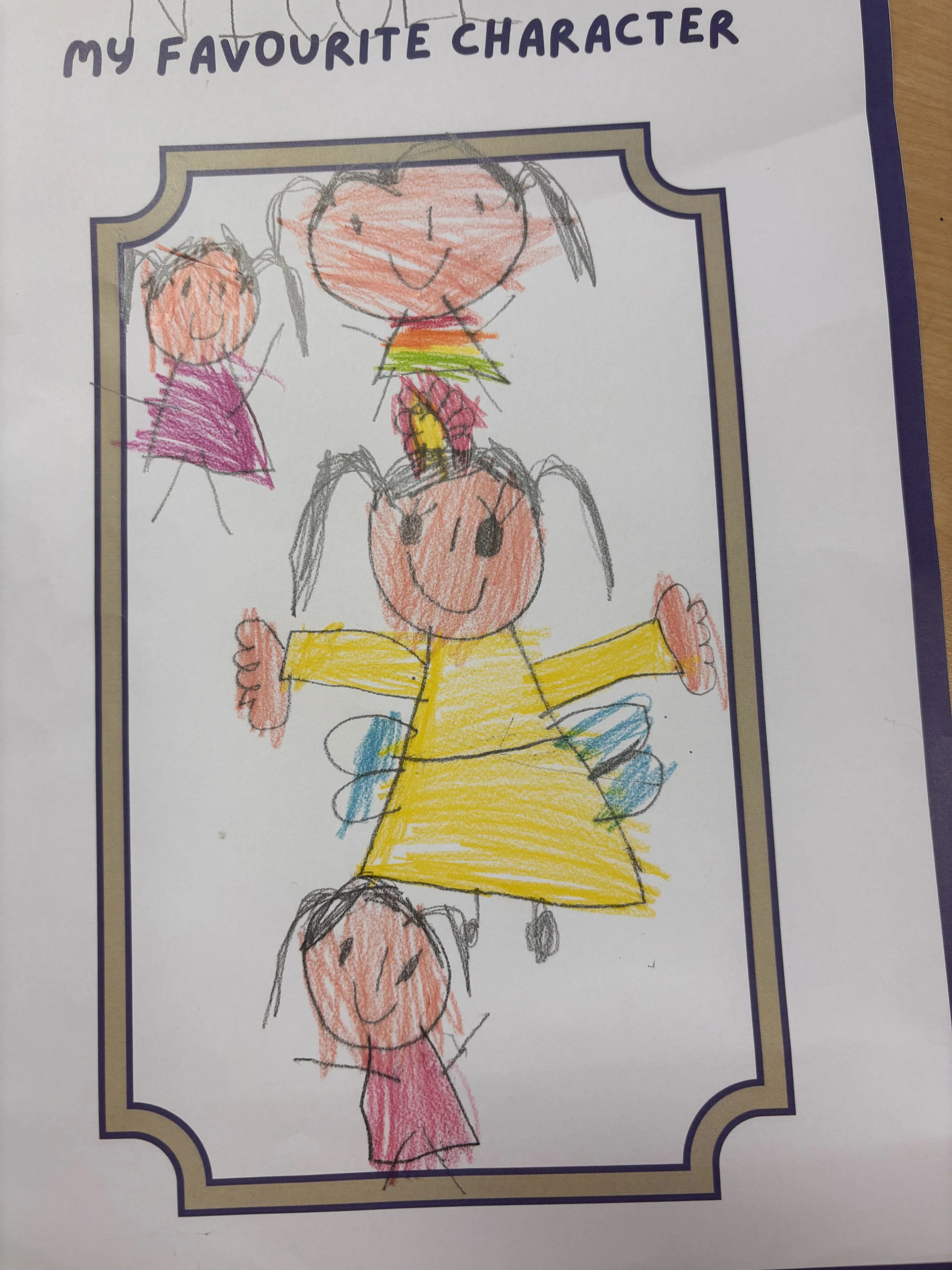 Colorful children's drawing of a girl with pigtails, smiling, wearing a rainbow top, yellow skirt, and pink shoes, surrounded by four large, smiling pumpkins, with the words 'My Favourite Character' written at the top.
