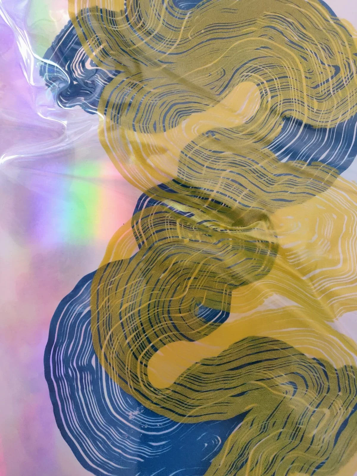Abstract artwork with swirling patterns in gold, black, and white over a pastel background with hints of purple, green, and pink.
