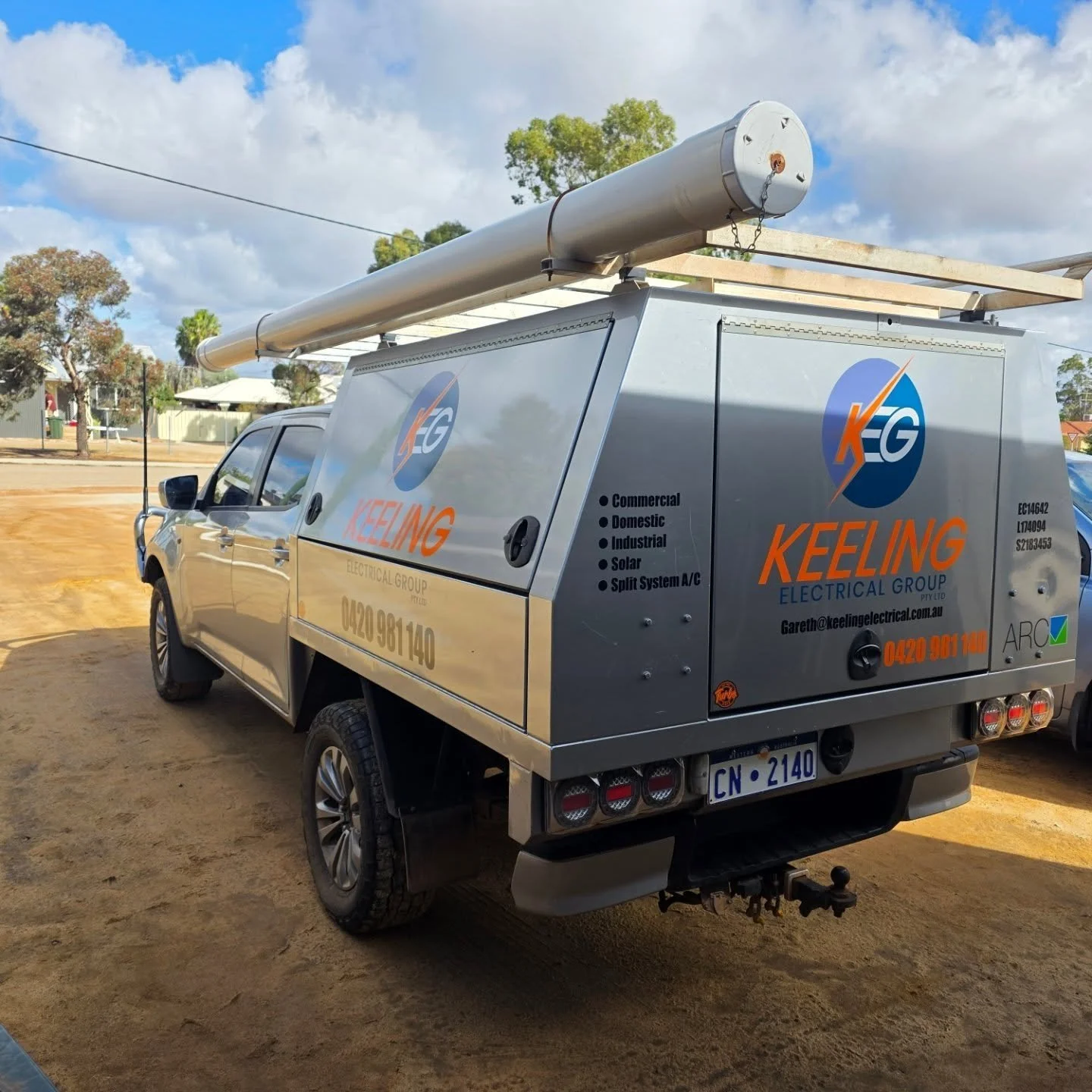 Oranssi technician working on a roof project