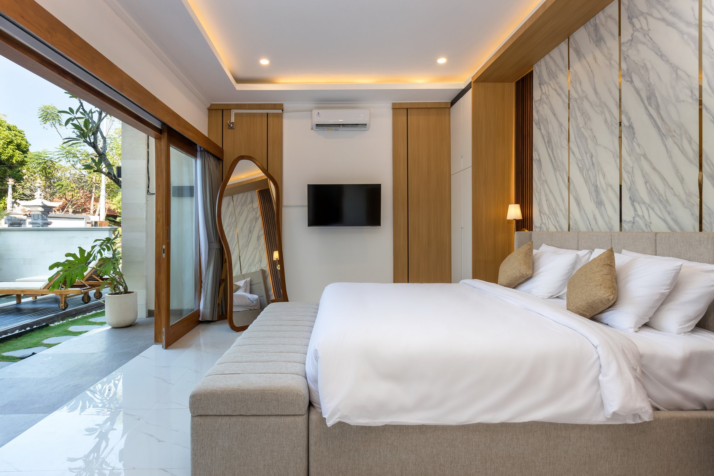 Spacious ensuite bedroom at Villa Anali with Smart TV and pool access