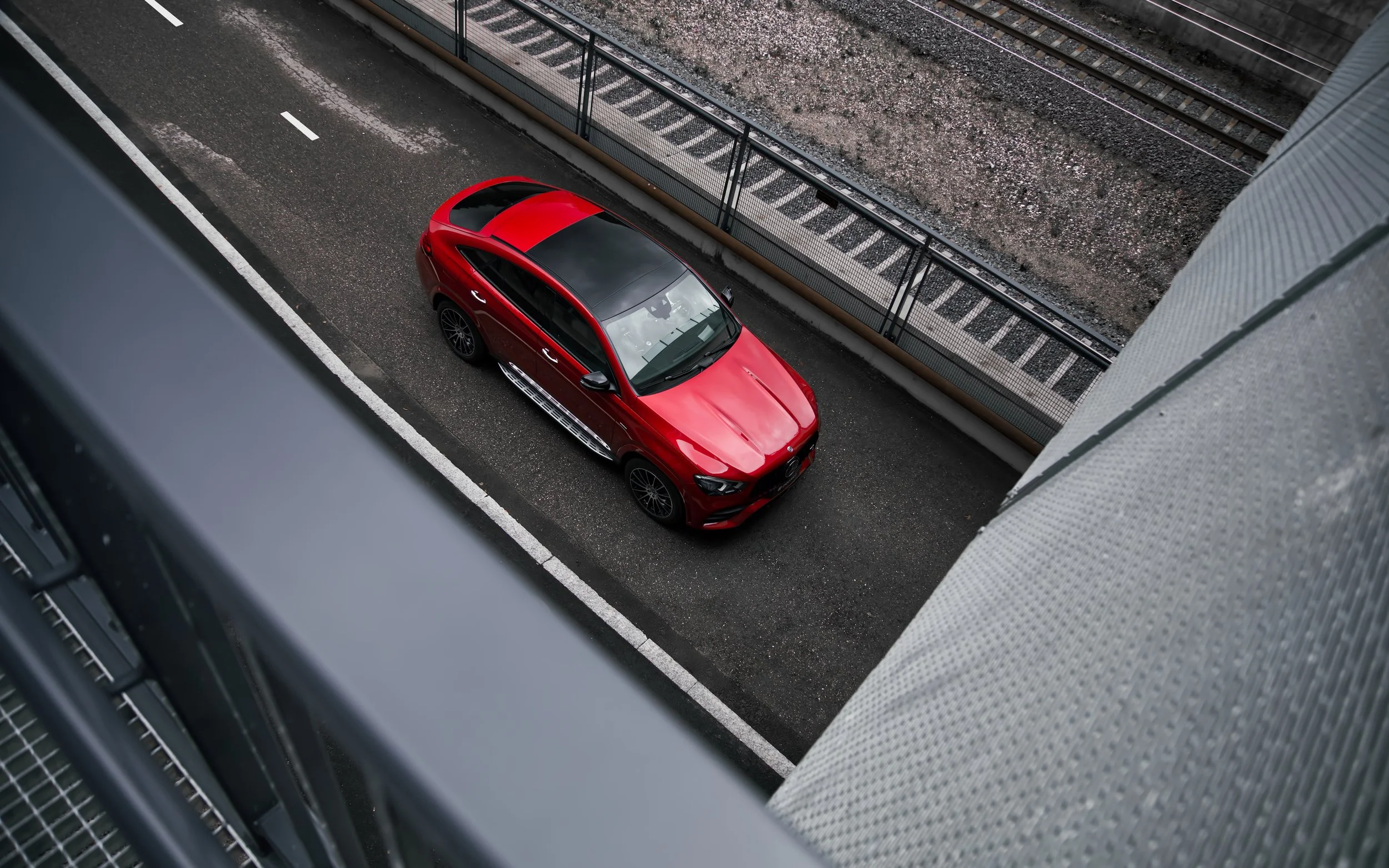 Red Mercedes-Benz GLE coupe car photographed by Annika TheVolvoGirl Miftakhova for Parrotz Suomi in Helsinki, Finland