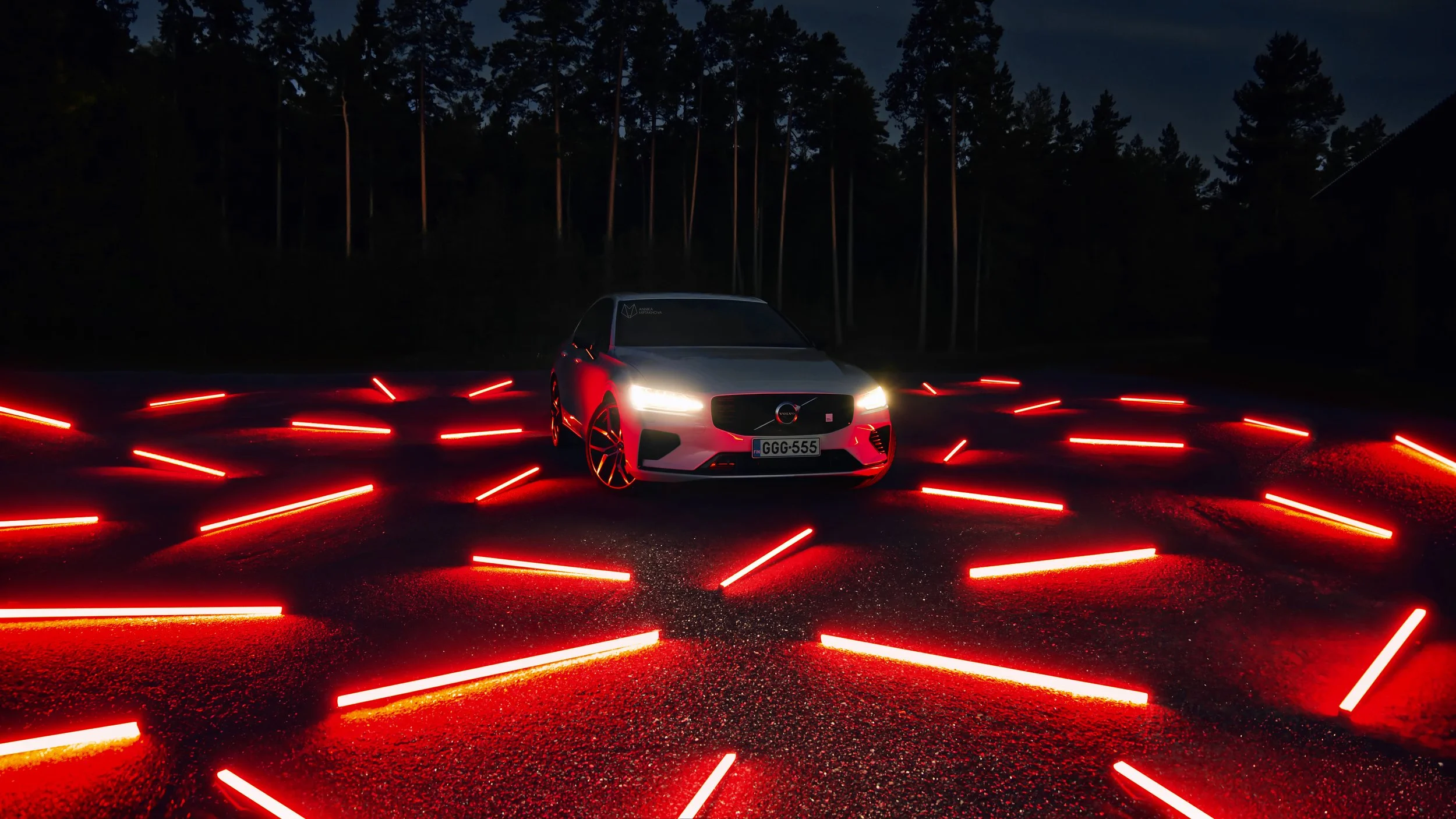 White Volvo S60 photographed on a floor of red lamps in Helsinki by Annika TheVolvoGirl Miftakhova 
