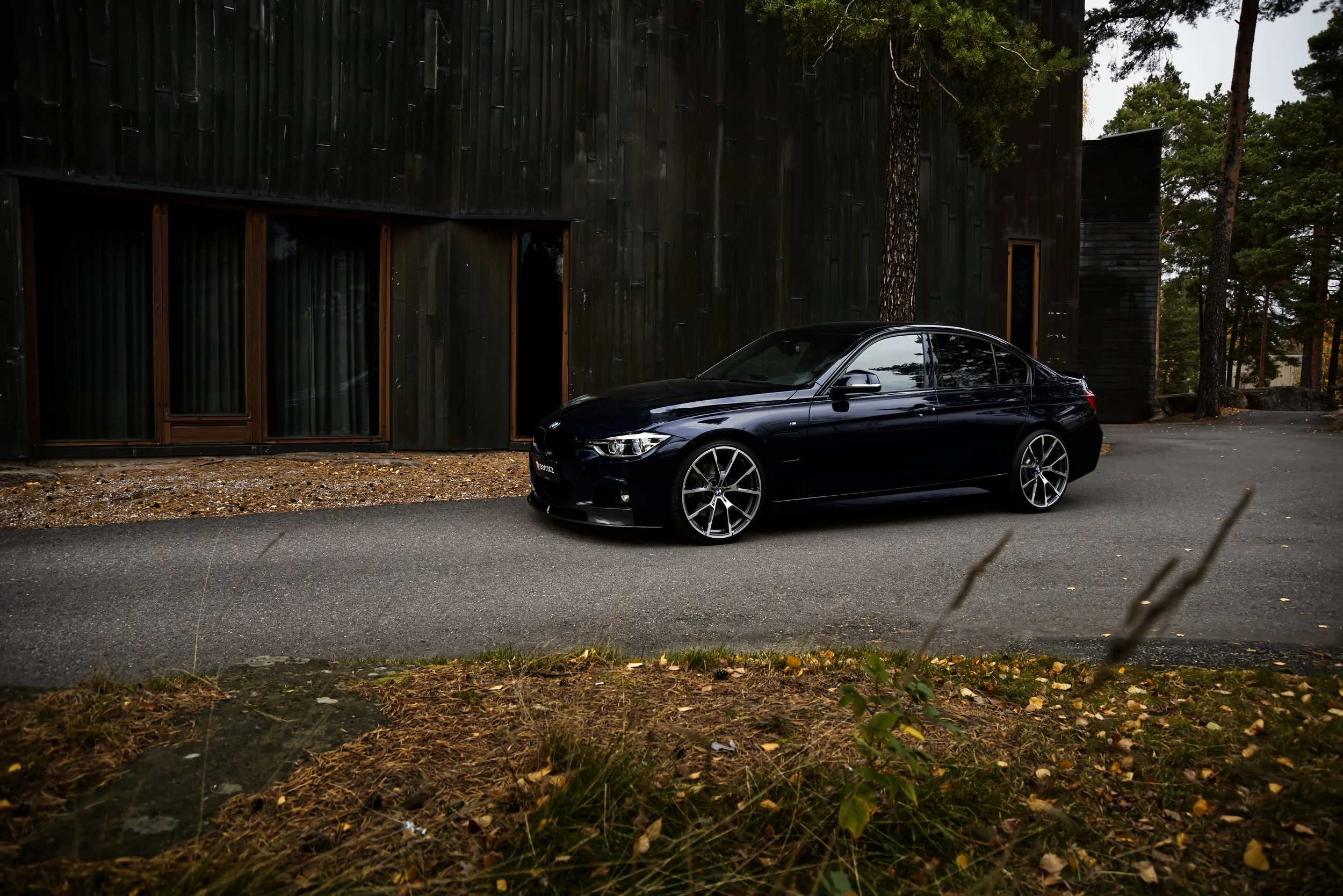 Side profile of Blue BMW 3-series car photographed by Annika TheVolvoGirl Miftakhova for Parrotz Suomi in Espoo, Finland