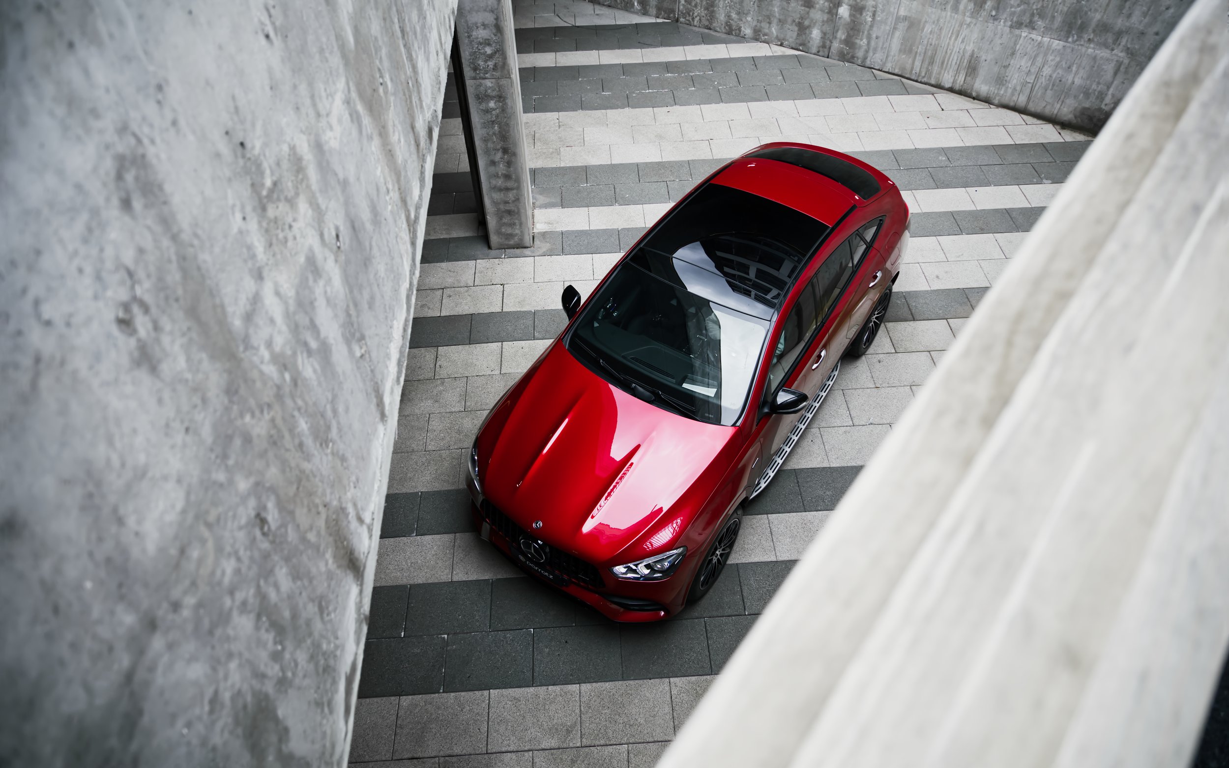 Red Mercedes-Benz GLE coupe car photographed by Annika TheVolvoGirl Miftakhova for Parrotz Suomi in Helsinki, Finland