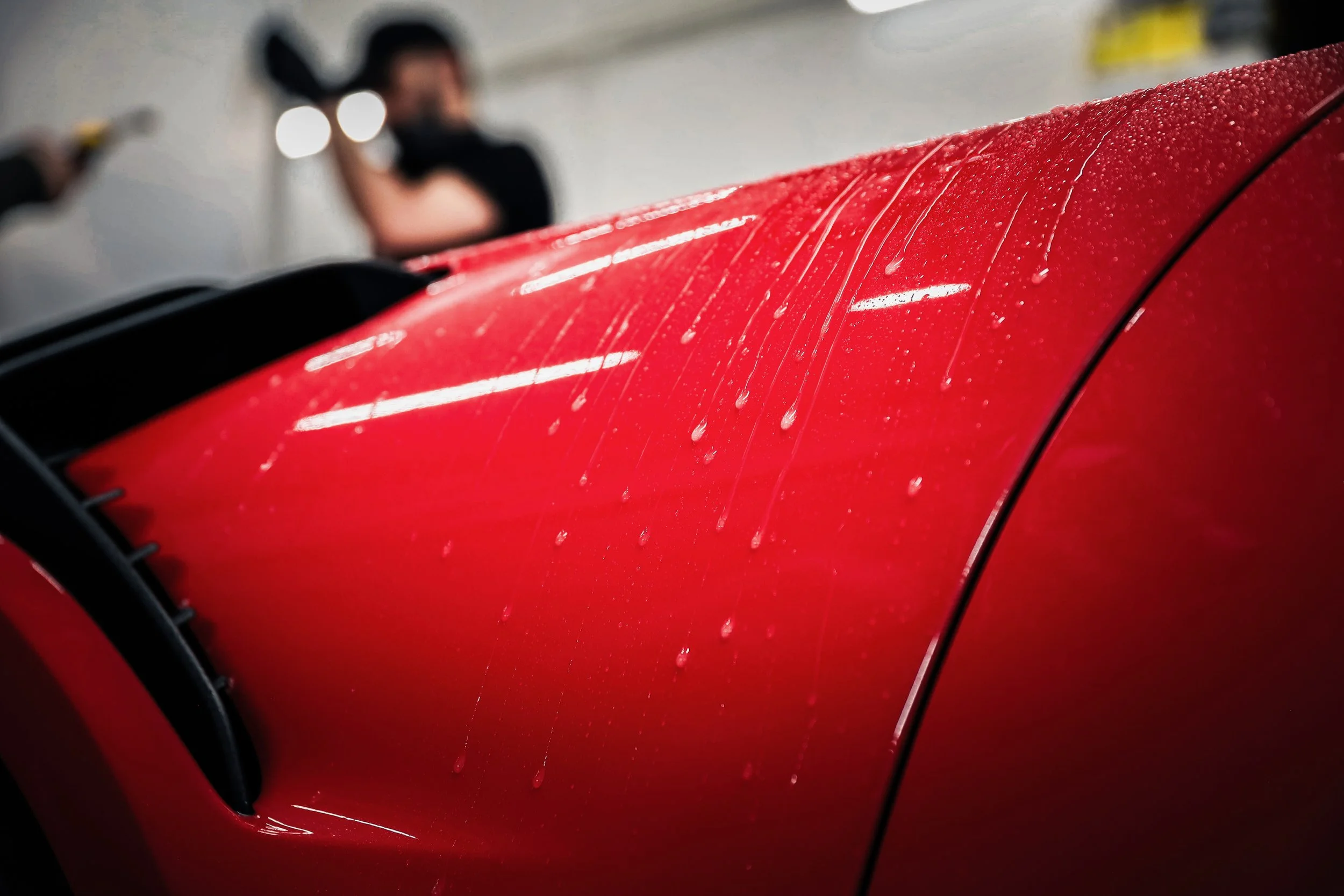 Red Porsche GT3 RS being prepared for Paint Protection Film at Wrapster Sweden in Örebro, Sweded, photographed by Annika TheVolvoGirl Miftakhova.