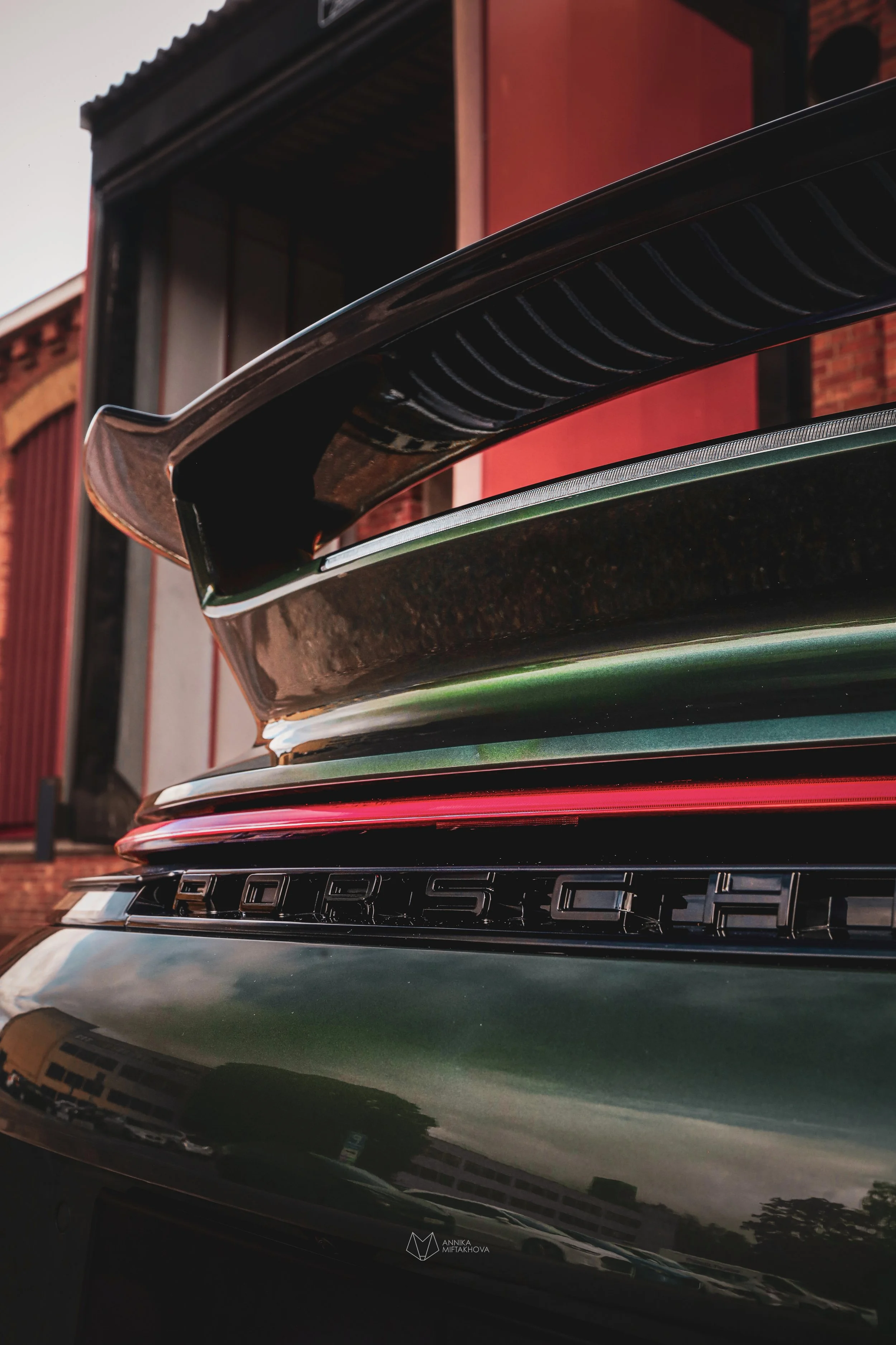 Rear spoiler of Olive Green Porsche 911 photographed in Örebro, Sweden by Annika TheVolvoGirl Miftakhova