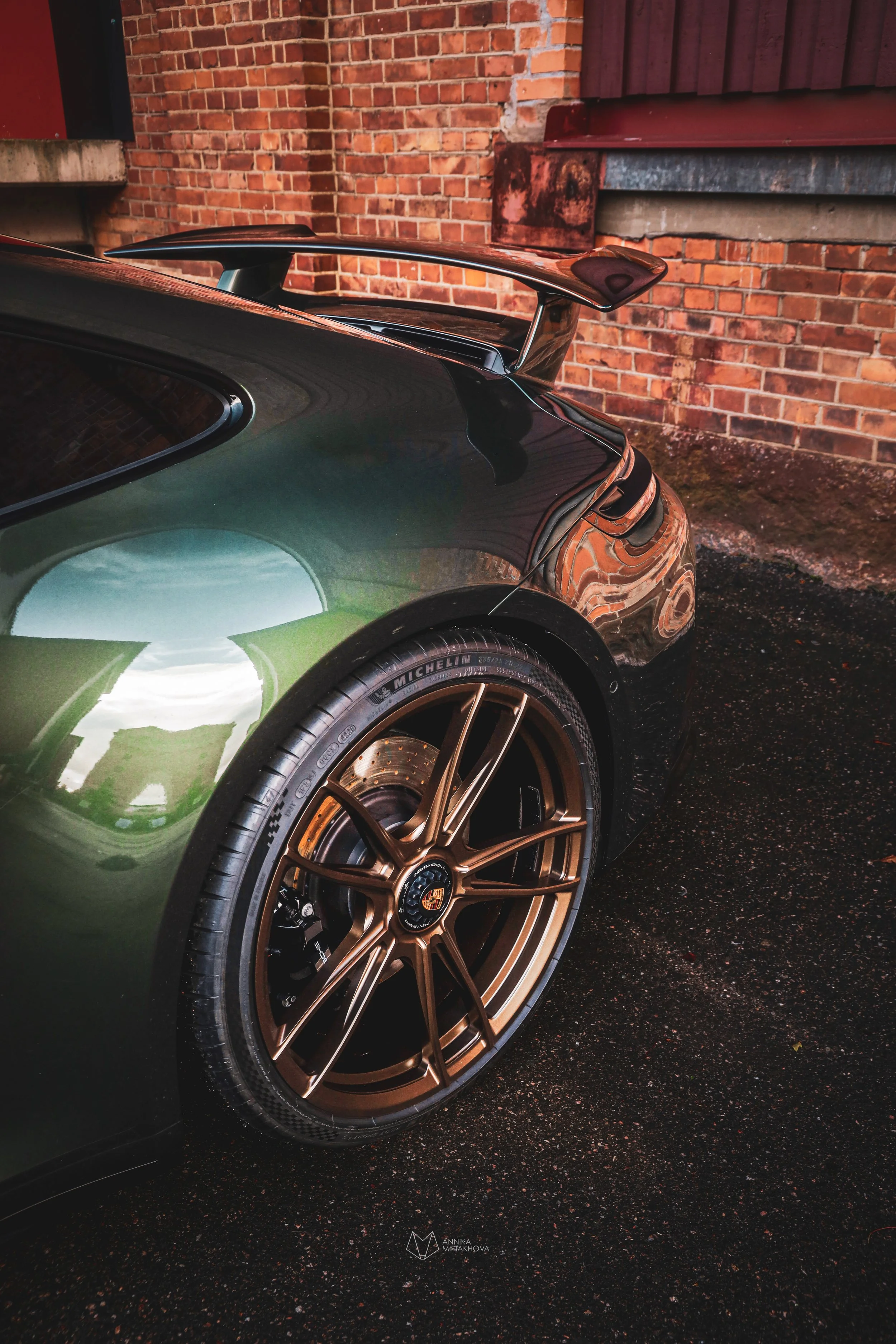 Rear wheel arch of Olive Green Porsche 911 photographed in Örebro, Sweden by Annika TheVolvoGirl Miftakhova