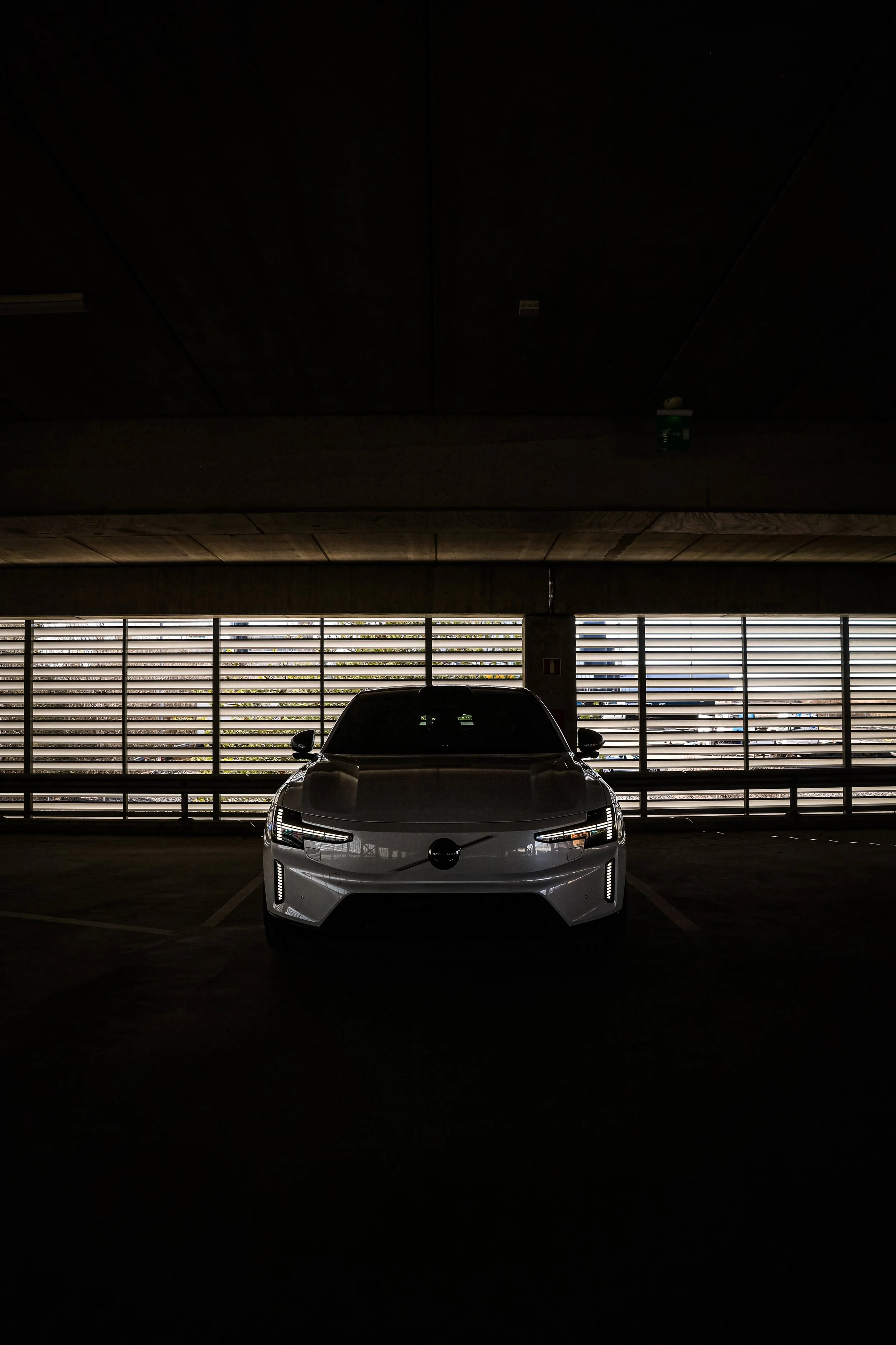 White Volvo ES90 photographed in dimmed parking lot in Helsinki, Finland by Annika TheVolvoGirl Miftakhova