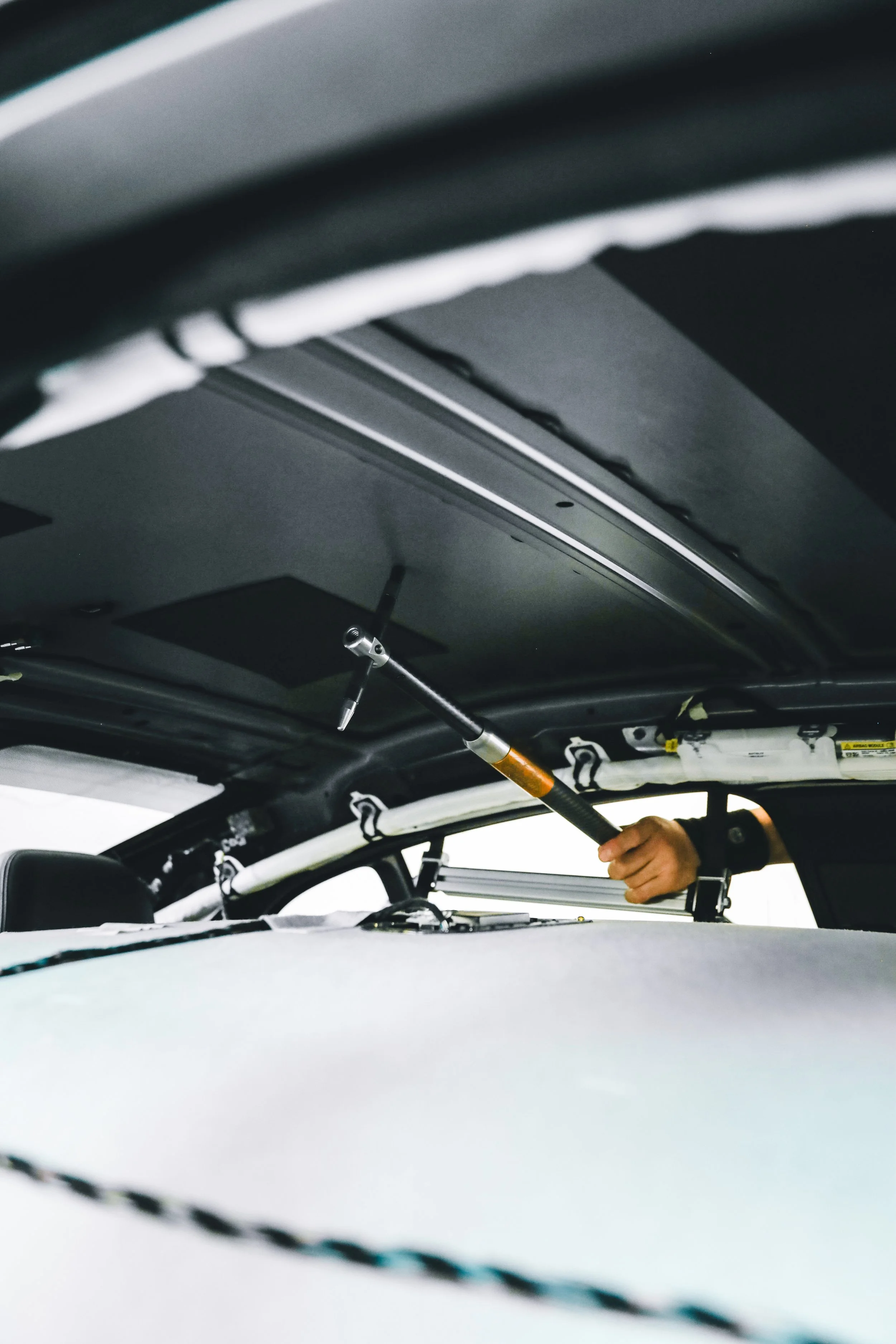 PDR tool used to straighten roof dents photographed by Annika TheVolvoGirl Miftakhova in Helsinki, Finland